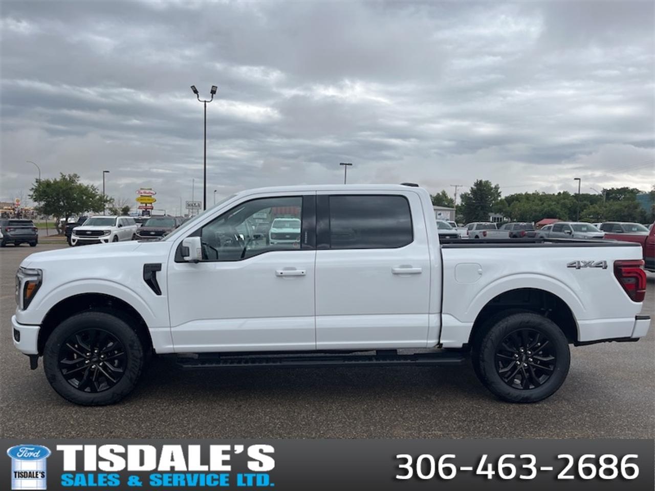 <b>Lariat Black Appearance Package, Sunroof, 20 inch Aluminum Wheels, Tow Package, Spray-in Bedliner!</b><br> <br> Check out the large selection of new Fords at Tisdales today!<br> <br>The 2026 Ford F-150 brings unmatched capability, advanced innovation and bold design to the full-size pickup segment.<br> <br>The 2026 Ford F-150 combines proven leadership in toughness with smart innovation to deliver a truck built for real-world demands. Inside, the cabin features refined materials, intuitive tech and comfortable seating to support both driver and passengers on every journey. With its strong presence, flexible design and Fords legacy of dependability, the F-150 is ready for whatever work or play you throw its way.<br> <br>This Oxford White Crew Cab 4X4 pickup has an Automatic transmission and is powered by a 382HP 3.5L V6 Cylinder Engine. <br> <br> Our F-150s trim level is LARIAT. Designed for premium truck enthusiasts who demand upscale refinement alongside rugged capability, this stunning pickup stands out with its bold chrome grille, chrome bumpers with dual tow hooks, convenient running boards, directionally adaptive projector-beam LED headlights, and brilliant chrome-like PVD wheels. Inside, the luxurious cabin welcomes you with heated and ventilated ActiveX-trimmed power front seats featuring driver memory settings, a heated leatherette steering wheel, elegant metal-look accents, and clever second-row underseat storage. Premium convenience and connectivity are always at your fingertips thanks to proximity keyless entry, voice-activated dual-zone automatic climate control, power-adjustable pedals, and an outstanding eight-speaker B&O sound system paired with a 12-inch SYNC 4 display featuring connected navigation and a built-in Wi-Fi hotspot. Finally, you can travel with ultimate peace of mind backed by top-tier safety technology, including the innovative BlueCruise driving system, a comprehensive aerial view camera system, adaptive cruise control with stop-and-go, and a blind spot information system with cross-traffic alert and reverse brake assist. This vehicle has been upgraded with the following features: Lariat Black Appearance Package, Sunroof, 20 inch Aluminum Wheels, Tow Package, Spray-in Bedliner.<br><br> View the original window sticker for this vehicle with this url <b><a href=http://www.windowsticker.forddirect.com/windowsticker.pdf?vin=1FTFW5L85TFB69097 target=_blank>http://www.windowsticker.forddirect.com/windowsticker.pdf?vin=1FTFW5L85TFB69097</a></b>.<br> <br>To apply right now for financing use this link: <a href=http://www.tisdales.com/shopping-tools/apply-for-credit.html target=_blank>http://www.tisdales.com/shopping-tools/apply-for-credit.html</a><br> <br/>Total rebate of $2500 is reflected in the price. 3.99% financing for 84 months. <br> Buy this vehicle now for the lowest bi-weekly payment of <b>$584.73</b> with $0 down for 84 months @ 3.99% APR O.A.C. ( Plus applicable taxes - $699 administration fee included in sale price. ). Incentives expire 2026-08-31. See dealer for details. <br><br>Tisdales is not your standard dealership. Sales consultants are available to discuss what vehicle would best suit the customer and their lifestyle, and if a certain vehicle isnt readily available on the lot, one will be brought in.<br> Come by and check out our fleet of 20+ used cars and trucks and 80+ new cars and trucks for sale in Kindersley.  o~o