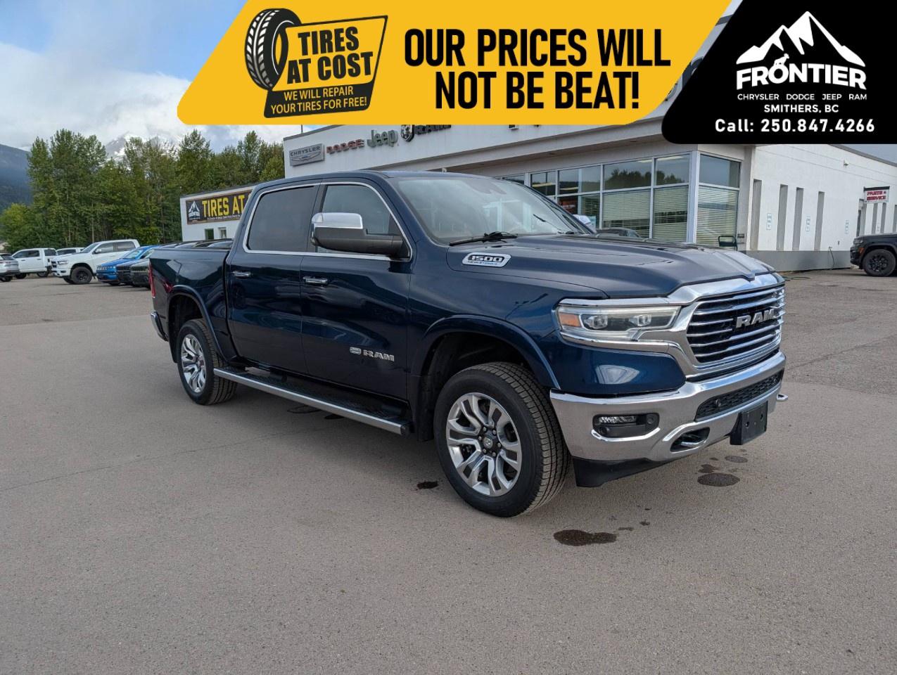 <p>The 2022 Ram 1500 Longhorn Crew Cab 4x4 blends premium western-inspired luxury with legendary HEMI® performance, making it the perfect truck for work, towing, and everyday comfort.</p><p> </p><p>Powered by the legendary <strong>5.7L HEMI® VVT V8 engine with eTorque mild hybrid technology</strong> paired with an 8-speed automatic transmission, this <strong>gasoline-powered</strong> pickup delivers impressive power, smooth performance, and confident towing capability. The 4x4 system, 3.92 rear axle ratio, anti-spin differential, and Trailer Tow Group make it ready to tackle demanding jobs and weekend adventures alike.</p><p>Finished in Patriot Blue Pearl with a Black and Cattle Tan premium leather interior, the Longhorn stands apart with its distinctive western-inspired styling, premium materials, and refined craftsmanship. Inside, you'll enjoy heated and ventilated front bucket seats, a heated steering wheel, dual-zone automatic climate control, power-adjustable front seats, a power sunroof, remote start, and an expansive 12-inch Uconnect® 5 NAV touchscreen.</p><p>Technology features include wireless Apple CarPlay®, Android Auto, Bluetooth® connectivity, a 12-inch full-colour driver information display, navigation, SiriusXM® with 360L, and multiple USB charging ports to keep everyone connected on the road.</p><p>Designed with capability in mind, this Ram is equipped with the Trailer Tow Group, Trailer Brake Control, Trailer Reverse Steering Control, chrome power-fold trailer tow mirrors, Class IV hitch receiver, a 33-gallon fuel tank, and a rear power sliding window, making towing easier and more confident.</p><p>Safety and driver assistance features include Full-Speed Forward Collision Warning Plus, ParkView® Rear Back-Up Camera, Park-Sense® Front and Rear Park Assist with Stop, Rain-Sensing Windshield Wipers, Ready Alert Braking, Electronic Stability Control, Brake Assist, and Trailer Sway Control.</p><p>With premium Longhorn luxury, legendary HEMI® V8 performance, advanced technology, and exceptional towing capability, the 2022 Ram 1500 Longhorn Crew Cab 4x4 is ready for whatever lies ahead.</p><p>Please confirm all vehicle details and features with our sales team prior to purchase and start the buying process today at Frontier Chrysler Dodge Jeep Ram Ltd., proudly serving Smithers, BC and surrounding area.</p><p>Final price does not include taxes, $995 administration fee, $10 VSA transaction levy, $398 finance placement fee (if applicable), and any dealer installed accessories.</p>