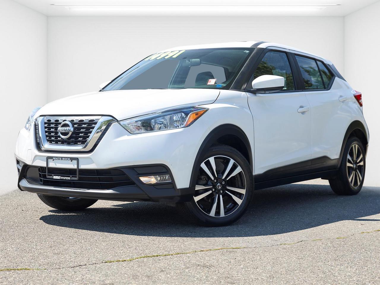 No Accidents | Low Kilometres | Fuel Efficient | Apple CarPlay & Android Auto | Heated Seats | Backup Camera | Bluetooth | Heated Seats<br /><br />2019 Nissan Kicks SV FWD<br /><br />This 2019 Nissan Kicks SV FWD is now available at White Rock Hyundai, offering excellent fuel economy, easy city driving, and practical everyday value in a compact crossover. Finished in White and powered by a 1.6L 4-cylinder engine paired with a CVT, this Kicks delivers smooth and efficient performance for commuting through White Rock, South Surrey, Surrey, Delta, Langley, and Vancouver.<br /><br />With only 75,000 kilometres and no accidents reported, this Nissan Kicks SV stands out as a smart choice for drivers looking for affordability, reliability, and modern features. Well-equipped with features such as Apple CarPlay, Android Auto, heated seats, Bluetooth, a backup camera, and helpful safety technology, it offers a comfortable and connected drive while staying easy to park and efficient to own. If you're searching for a used Nissan Kicks for sale in White Rock, this low kilometre SV FWD is a great option.<br /><br />Why Buy From White Rock Hyundai?<br />* 7x Hyundai President's Award of Merit Winner<br />* 3x Consumer Choice Award for Business Excellence<br />* AutoTrader Dealer of the Year<br /><br />M-Promise Certified Pre-Owned ($995 value) includes:<br />* 30-day / 2,000 km Exchange Program<br />* 3-day / 300 km Money Back Guarantee<br />* Comprehensive 144-Point Mechanical Inspection<br />* Full Synthetic Oil Change<br />* BC Verified CARFAX<br />* Minimum 6 Month Powertrain Warranty<br /><br />Buy with confidence at White Rock Hyundai. Our vehicles are priced competitively based on market demand, condition, and kilometres to give our customers a transparent and hassle-free buying experience.<br /><br />Visit White Rock Hyundai today to test drive this 2019 Nissan Kicks SV FWD. We proudly serve drivers in White Rock, South Surrey, Surrey, Delta, Langley, and Vancouver with quality pre-owned vehicles and a professional, no-pressure experience.<br /><br />Contact our team today to confirm availability, explore financing options, and reserve this vehicle.<br /><br />* All vehicle purchases are subject to a $799 administration fee. Dealer #31129.