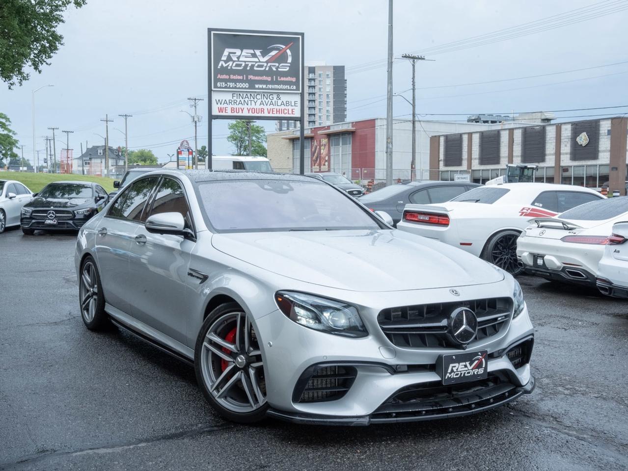 2020 Mercedes‑AMG E 63 S 4MATIC+ | Stage 2 Tuned | AMG Performance Packages <br/> <br/> Iridium Silver Metallic Exterior | Black/Anthracite Exclusive Leather Interior | AMG Handcrafted 4.0L Biturbo V8 Engine | 603 Horsepower / 627 lb‑ft Torque (Factory Output) | Stage 2 Performance Tune | AMG SPEEDSHIFT 9‑Speed Automatic Transmission | AMG Performance 4MATIC+ All‑Wheel Drive | AMG Performance Interior Package | AMG Performance Exterior Package | AMG Dynamic Engine Mounts | Electronic Locking Differential | AIRMATIC Semi‑Active Air Suspension | AMG Double‑Spoke 20‑Inch Wheels | AMG Styling Package | AMG Spoiler Lip | Red AMG Brake Calipers | Switchable AMG Exhaust System | Panoramic Sliding Sunroof | Climatised Front Seats | Heated Front Seats | Heated Rear Seats | Heated Steering Wheel | Head‑Up Display | Premium Sound System | COMAND Navigation | Apple CarPlay & Android Auto | Wireless Charging | Keyless‑Go Package | Ambient Interior Lighting | 360° Camera | Active Parking Assist | DISTRONIC Plus Adaptive Cruise Control | Driving Assistance Package | and much much more. <br/> <br/> <br/> Features Include: <br/> <br/> <br/> Stage 2 Performance Tune | AMG Performance Interior Package | AMG Performance Exterior Package | AIRMATIC Air Suspension | AMG Dynamic Engine Mounts | Electronic Locking Differential | Switchable Exhaust System | Head‑Up Display | Panoramic Sunroof | Climatised Front Seats | Heated Front & Rear Seats | Heated Steering Wheel | 360° Camera | Active Parking Assist | DISTRONIC Plus | Wireless Charging | Apple CarPlay | Android Auto | Premium Ambient Illumination | Carbon Fibre Centre Console. <br/> <br/> <br/> The 2020 Mercedes‑AMG E 63 S 4MATIC+ combines supercar performance, executive luxury, and advanced technology into one of AMGs most impressive high‑performance sedans. <br/> <br/> <br/> Key Features <br/> <br/> <br/> Aggressive AMG Styling <br/> Finished in elegant Iridium Silver Metallic, this E 63 S showcases the AMG Performance Exterior Package, AMG Styling Package, AMG spoiler lip, red-painted brake calipers, and staggered 20‑inch AMG double‑spoke wheels. Its muscular stance and performance-focused design make an unmistakable statement on the road. <br/> <br/> <br/> Premium AMG Interior <br/> Inside, the cabin is appointed in Black/Anthracite Exclusive Leather and enhanced by the AMG Performance Interior Package. High‑Gloss Carbon Fibre trim, a Nappa Leather/Microfiber AMG steering wheel, illuminated door sills, and premium craftsmanship throughout create an environment that perfectly balances luxury and performance. <br/> <br/> <br/> Enhanced AMG V8 Performance <br/> At the heart of this E 63 S is Mercedes‑AMGs legendary handcrafted 4.0L Biturbo V8. Equipped with a Stage 2 performance tune, this sedan delivers even sharper throttle response and exhilarating acceleration. Paired with AMG Performance 4MATIC+ all‑wheel drive, AMG Dynamic Engine Mounts, an Electronic Locking Differential, and a factory Switchable Exhaust System, it offers a truly unforgettable driving experience. <br/> <br/> <br/> Advanced Mercedes‑Benz Technology <br/> COMAND Navigation, Apple CarPlay, Android Auto, Wireless Charging, a Head‑Up Display, Mercedes‑Benz Connect Services, and a Digital Instrument Display provide seamless connectivity and convenience. Every feature has been designed to enhance the driving experience without compromising comfort. <br/> <br/> <br/> Confidence Through Intelligent Assistance <br/> Equipped with the Driving Assistance Package, DISTRONIC Plus Adaptive Cruise Control, Active Lane Change Assist, PRE‑SAFE®, Road Sign Recognition, Active Parking Assist, and a 360° Camera System, this AMG sedan incorporates advanced technologies designed to enhance awareness and convenience on every journey. <br/> <br/> <br/> Luxury, Comfort & Convenience <br/> Climatised Front Seats, Heated Front & Rear Seats, a Heated Steering Wheel, Premium Ambient Illumination, a Panoramic Sliding Sunroof, Keyless‑Go Package, and an Electric Rear Sunshade ensure exceptional comfort for both driver and passengers year‑round. <br/> <br/> <br/> With its Stage 2 tune, handcrafted AMG Biturbo V8, AMG Performance Interior and Exterior Packages, carbon fibre interior trim, advanced driver assistance technologies, and extensive luxury appointments, this 2020 Mercedes‑AMG E 63 S 4MATIC+ represents a rare opportunity to own one of the most complete high‑performance luxury sedans on the road today. <br/> <br/> <br/> This vehicle has travelled 72,761 Kms. <br/> <br/> <br/> *** NO additional fees except for taxes and licensing! *** <br/> <br/> <br/> *** 100-point inspection on all our vehicles & always detailed inside and out *** <br/> <br/> <br/> RevMotors is at your service to ensure you find the right car for YOU. Even if we do not have it in our inventory, we are more than happy to find you the vehicle that you are looking for. Give us a call at 613-791-3000 or visit us online at www.revmotors.ca <br/> <br/> <br/> Ça nous donnera du plaisir de vous servir en Français aussi! <br/> <br/> <br/> CERTIFICATION * As per OMVIC regulations - this vehicle is being sold AS-IS and is not considered road worthy - Certification / Safety is available for $899. <br/> FINANCING AVAILABLE * RevMotors offers competitive finance rates through many of the major banks. Should you feel like youve had credit issues in the past, we have various financing solutions to get you on the road. We accept No Credit - New Credit - Bad Credit - Bankruptcy - Students and more!! Please keep in mind the default loan structure found on the vehicle page is a template. The exact rate and terms that a vehicle qualifies for may differ. All quotes are subject to lender approval. <br/> EXTENDED WARRANTY * For your peace of mind, if one of our used vehicles is no longer covered under the manufacturer’s warranty, RevMotors will provide you with a 6 month / 6000KMS Limited Powertrain Warranty. You always have the options to upgrade to more comprehensive coverage as well. Well be more than happy to review the options and chose the coverage thats right for you! <br/> TRADES * Do you have a Trade-in? We offer competitive trade in offers for your current vehicle! <br/> SHIPPING * We can ship anywhere across Canada. Give us a call for a quote and we will be happy to help! <br/> <br/> <br/> Buy with confidence knowing that we always have your best interests in mind! <br/>