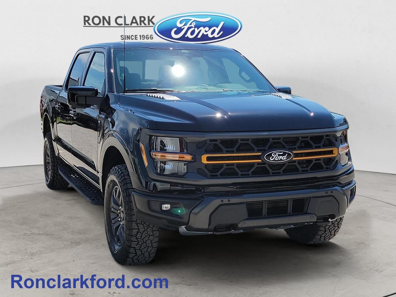 Take on your next adventure in this 2026 Ford F-150 Tremor finished in Agate Black Metallic with a Black leather-trimmed interior. Powered by the proven 3.5L EcoBoost V6 engine paired with a smooth 10-speed automatic transmission, this Tremor delivers impressive performance on and off the road while offering the capability you need for work, towing, and weekend escapes. Equipped with the 420A Equipment Group, Tow/Haul Package, and an integrated trailer brake controller, its built to handle demanding jobs with confidence.Thoughtfully equipped for both productivity and convenience, this truck features the Mobile Office Package with a wireless charging pad, 2kW Pro Power Onboard, and the Bed Utility Package with the Pro Access Tailgate, making it easy to stay organized and get more done wherever the day takes you. The bold modular front bumper with Carbon Black accents adds to the Tremors rugged appearance, while ambient lighting and the premium B&O Unleashed Sound System create a comfortable and refined cabin. Combining off-road capability, advanced technology, and everyday practicality, this 2026 F-150 Tremor is ready for whatever comes next.Come to the dealer you can trust.60 years and counting Ron Clark Ford & Jayco RV is known for great value and being best in customer service! We serve and deliver all over Ontario including destinations such as Wyoming, Petrolia, Sarnia, London, Guelph, Kitchener-Waterloo, Hamilton, GTA, Ottawa & Chatham-Kent. Call or visit us at RON CLARK FORD & JAYCO RV to view and test drive today! RON CLARK FORD where else!!