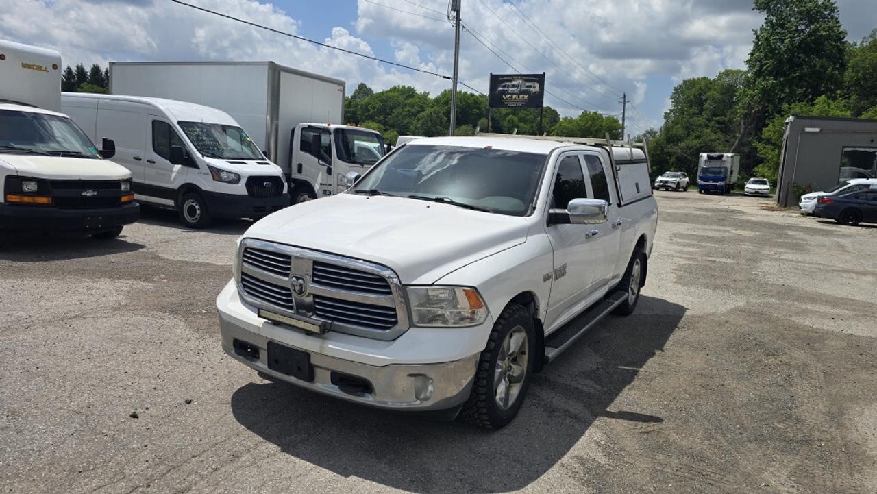 2015 RAM 1500 SLT - QuadCab - 4x4 - 5.7L V8 + Truck Cap Photo