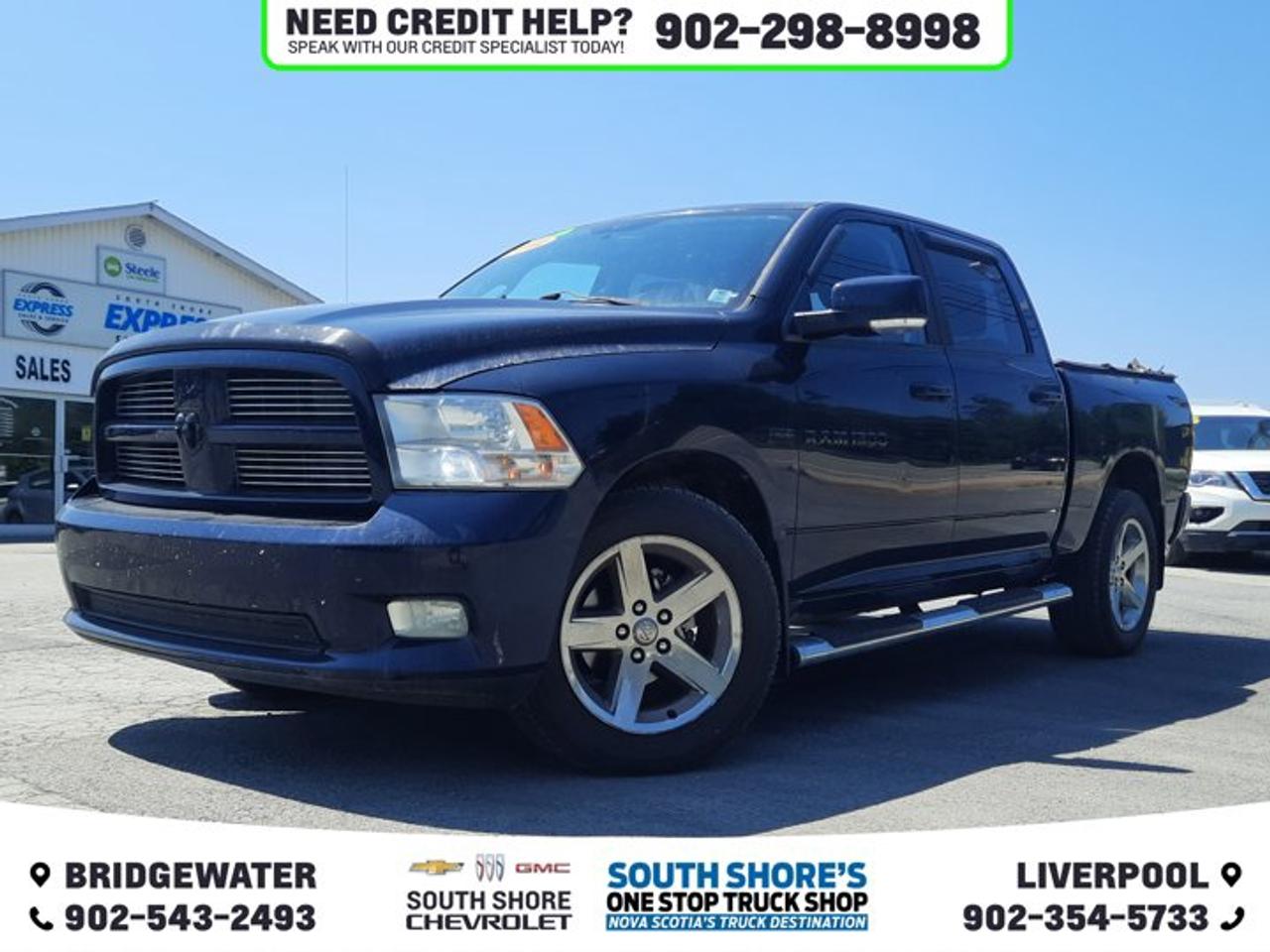 Awards: * 2012 KBB.com 10 Best Used Trucks Under $20,000 Recent Arrival! True Blue Pearlcoat 2012 Ram 1500 Sport For Sale, Bridgewater 4WD 6-Speed Automatic HEMI 5.7L V8 Multi Displacement VVT 6 Speakers, ABS brakes, Air Conditioning, Alloy wheels, Auto-dimming door mirrors, Brake assist, Bumpers: body-colour, CD player, Cloth Bucket Seats, Compass, Delay-off headlights, Driver door bin, Electronic Stability Control, Front anti-roll bar, Front fog lights, Front wheel independent suspension, Fully automatic headlights, Hard Drive, Illuminated entry, Outside temperature display, Panic alarm, Power door mirrors, Power Lumbar Adjust, Power steering, Power windows, Quick Order Package 25L Sport, Speed control, Tachometer, Tilt steering wheel, Traction control, Trailer Brake Control, Trip computer, Turn signal indicator mirrors, Variably intermittent wipers. Reviews: * Best-in-class ride quality; well-made interior; clever storage spaces; powerful V8; lots of interior space. Source: Edmunds * If you need a pickup truck that is as tough as the rugged image it portrays, but youd also like something with a civilized ride and a nice interior to double as the family road-trip machine, the 2012 Ram 1500 pickup up makes a nice compromise. And, the Hemi badge on the side is sure to impress your buddies. Source: KBB.com
