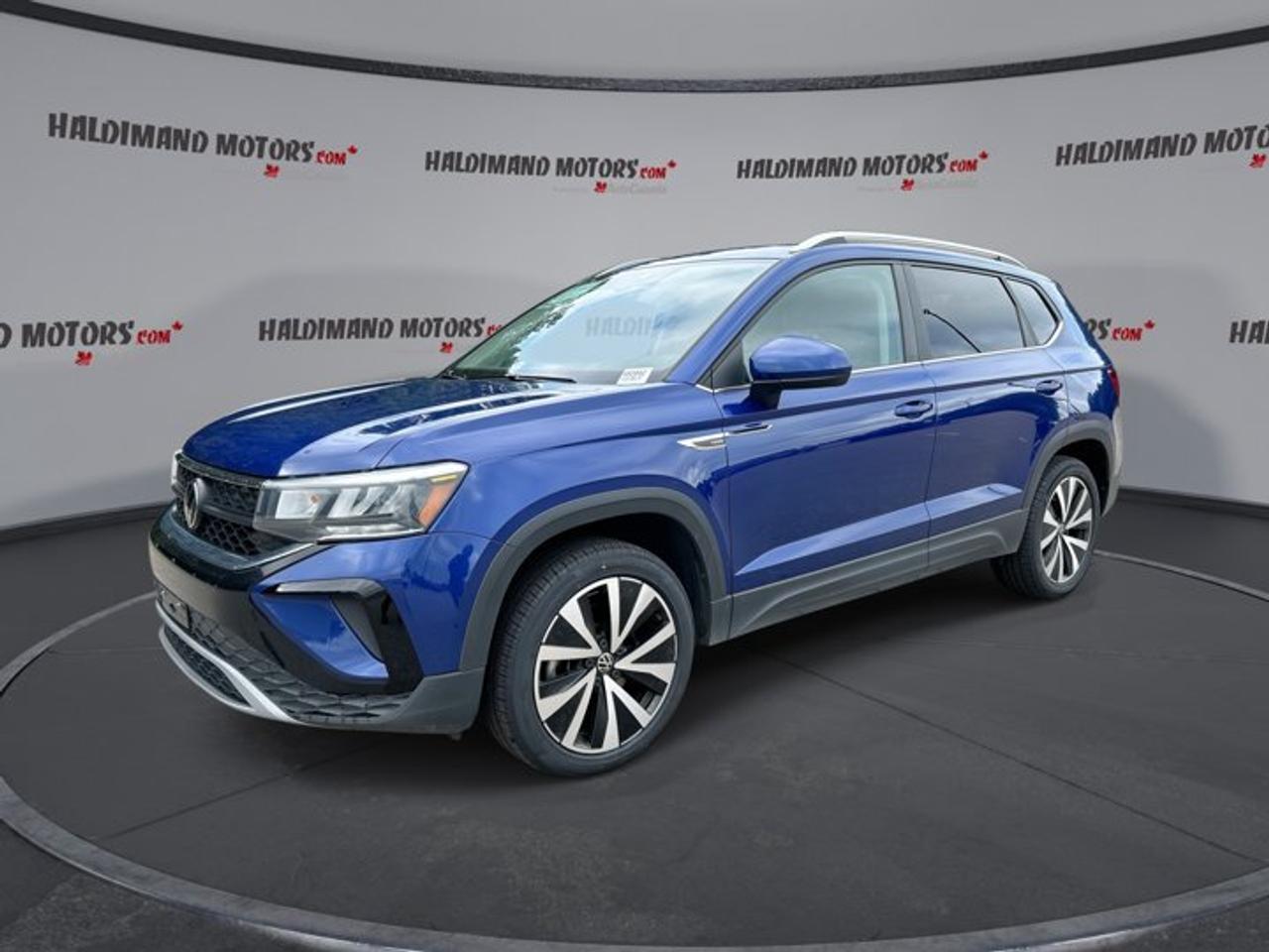 // ACCIDENT FREE!! //<br /><br />Meet the 2023 Volkswagen Taos Comfortline 4WD, a smart compact SUV that fits daily life with ease. This used Taos comes finished in Blue with a Black interior, four doors, and a smooth automatic transmission. It has 94,794 km and offers practical comfort, modern safety, and confident all-weather traction.<br /><br />Built with a 1.5-litre gas engine, the 2023 Volkswagen Taos Comfortline 4WD balances useful power with everyday efficiency. Its roomy layout, heated steering wheel, panoramic sunroof, and advanced driver-assist features make it a great match for commuting, family travel, and weekend trips around Cayuga and beyond.<br /><br />FEATURES OF THE Taos Comfortline 4WD | No Accidents | Heated Steering<br /><br />   Heated steering wheel adds cold-weather comfort<br />   Panoramic sunroof brightens every drive<br />   4WD adds extra road confidence<br />   Adaptive cruise control supports highway ease<br /><br />ADVANCED SAFETY FEATURES<br /><br />   Backup camera helps with reverse visibility<br />   Blind spot monitor adds lane awareness<br />   Lane departure warning supports safer travel<br />   Side and head airbags enhance protection<br /><br />The 2023 Volkswagen Taos Comfortline 4WD gives you peace of mind with a strong list of key safety features. Anti-Lock Braking System, stability control, child safety locks, tire pressure monitoring, and automatic headlights help make each drive feel more secure in changing road and weather conditions.<br /><br />PERFORMANCE AND EFFICIENCY<br /><br />   1.5-litre gas engine balances power efficiently<br />   7-speed automatic supports smooth shifting<br />   Dual shift mode adds driver control<br />   Power steering helps easy city handling<br /><br />The 2023 Volkswagen Taos Comfortline 4WD is designed for drivers who want a composed and easy drive. Its automatic transmission works smoothly in traffic, while the compact SUV size helps with parking, lane changes, and day-to-day use without giving up useful interior space.<br /><br />COMFORT AND CONVENIENCE<br /><br />   Heated front seats warm cold mornings<br />   Dual-zone climate control improves cabin comfort<br />   Remote starter adds everyday convenience<br />   Drivers power seat supports easy adjustment<br /><br />Inside, the 2023 Volkswagen Taos Comfortline 4WD offers comfort features that make every trip more enjoyable. The heated steering wheel is a welcome touch in Canadian winters, while front air conditioning, automatic climate control, lumbar support, and power windows help keep the cabin relaxed and user-friendly.<br /><br />TECHNONOLGY AND CONNECTIVITY<br /><br />   Apple CarPlay keeps apps within reach<br />   Android Auto supports simple smartphone connection<br />   Bluetooth integration enables hands-free communication<br />   Steering wheel audio controls simplify access<br /><br />This 2023 Volkswagen Taos Comfortline 4WD keeps you connected with useful tech made for real life. Satellite radio adds entertainment choice, push button start adds convenience, and the auto-dimming rearview mirror helps reduce glare during evening drives for a more comfortable experience behind the wheel.<br /><br />CARGO SPACE<br /><br />   Rear trunk access makes loading simple<br />   Cargo cover helps keep items concealed<br />   Four-door layout improves passenger entry<br />   Rear spoiler adds sporty utility appeal<br /><br />The 2023 Volkswagen Taos Comfortline 4WD offers the flexibility many drivers want from a compact SUV. Grocery runs, sports gear, luggage, and daily essentials fit more easily thanks to its practical rear cargo area and versatile cabin design.<br /><br />AWARDS & RECOGNITIONS<br /><br />   Top Safety Pick, Insurance Institute for Highway Safety, 2023<br /><br />WHAT OTHER OWNERS LIKE<br /><br />   Comfortable ride for daily driving<br />   Easy-to-use infotainment and smartphone pairing<br />   Good cargo room for compact size<br />   Confident winter traction with 4WD<br /><br />Drivers often appreciate how the 2023 Volkswagen Taos Comfortline 4WD combines useful size, smart technology, and everyday comfort. From its heated features to its adaptive cruise control and panoramic sunroof, this SUV delivers strong value for drivers who want practicality without giving up convenience.<br /><br />This 2023 Volkswagen Taos Comfortline 4WD | No Accidents | Heated Steerings VIN is: 3VVNX7B22PM340901 .<br /><br />WHY CHOOSE US? <br /><br />Honest & Transparent Buying Experience: Weve been a trusted name in business since 1984.<br /><br />STRAIGHTFORWARD PRICING:<br />Our Advertised Price Includes:<br />>>Safety Certification (No separate fee!)<br />>>30-Day 100% Mechanical Warranty<br />>>FREE Carfax History Report.<br />>>No upcharge for paying cash.<br />(Prices Exclude HST and Licensing Fees only.)<br /><br />>>Browse 300+ vehicles all in ONE LOCATION<br /><br />EASY FINANCING: Great rates & open loans<br /><br />WE BUY CARS: Get Top Dollar for your trade-in, or sell us your vehicle for CASH! Even if you dont buy from us!<br /><br />STOP BY TODAY<br />Treat yourself - stop by Haldimand Motors Ltd. located at 42 Talbot St E, Cayuga, ON N0A 1E0 to make this car yours today!<br /><br />https://www.haldimandmotors.com/used/stock-460942.html