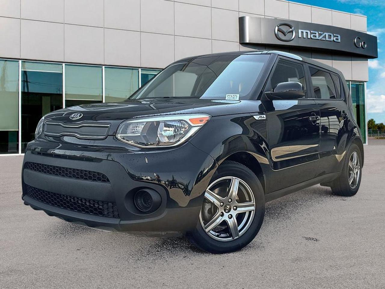 Looking for a reliable and stylish ride? Check out this pre-owned 2019 Kia Soul LX with a sleek black interior! Powered by a fuel-efficient 1.6L GDI I4 engine paired with a smooth 6-speed automatic transmission, it delivers great performance for city driving and beyond.Enjoy comfort with cloth front bucket seats, manual adjustable driver and passenger seats, and ample 5-passenger seating. Stay connected and entertained with AM/FM/MP3 radio, Bluetooth handsfree device connectivity, and steering wheel-mounted audio controls.Safety is prioritized with 6 airbags, electronic stability control, all-speed ABS, hill start assist, and a rear backup camera for confident parking.Additional perks include power door locks, keyless entry, deep tinted windows, manual climate control, and a spacious cargo area with tie-downs and concealed storage.This Kia Soul LX combines practicality, safety, and fun-to-drive features in one versatile package. Schedule your test drive today and experience why the Soul is the perfect urban companion!Go Mazda is an AMVIC licensed business.Clean CarFax.