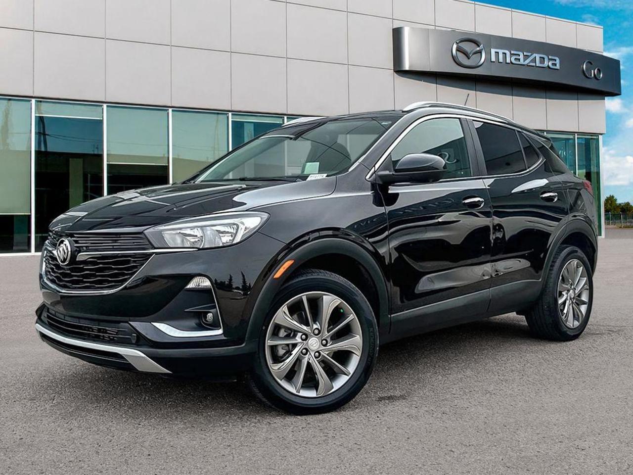 Discover the perfect blend of style, power, and advanced features with this pre-owned 2022 Buick Encore GX Select AWD. Finished in sleek Black, its powered by a turbocharged 1.3L Ecotec engine paired with a smooth 9-speed automatic transmission for responsive, efficient driving. Enjoy confidence and control year-round with all-wheel drive and advanced safety features including blind-spot warning and lane departure prevention.Stay connected and comfortable with heated leatherette-trimmed seats, dual-zone automatic climate control, wireless Apple CarPlay/Android Auto, and an 8-inch touchscreen infotainment system with navigation and SiriusXM. Tow with ease thanks to its 2,000 kg GVWR, while the 18 machined aluminum wheels and Ride and Handling suspension deliver a smooth and refined ride.With premium amenities like rear park assist, power liftgate, and a comprehensive suite of 10 airbags, this Encore GX offers safety, versatility, and comfort for you and your passengers. Dont miss out on this highly equipped, stylish, and dependable AWD SUV  visit us today and take it for a test drive!Go Mazda is an AMVIC licensed business.Clean Carfax