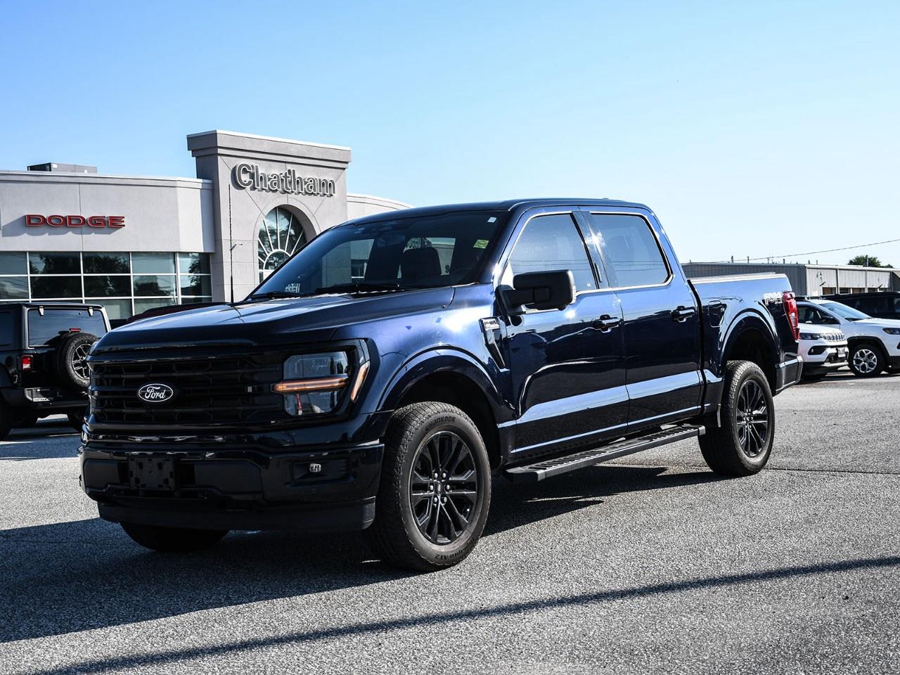 Not your average XLT. In fact, it's one of the hardest configurations to find.<br /><br />This 2024 Ford F-150 XLT SuperCrew is loaded with features that are rarely found together on an XLT. With leather-trimmed seating, a panoramic twin-panel moonroof, the XLT Black Appearance Package Plus, FX4 Off-Road Package, Mobile Office Package, and Bed Utility Package, this truck offers the premium feel many buyers expect from a Lariatwhile keeping the value and versatility of an XLT.<br /><br />Finished in stunning Antimatter Blue Metallic, it makes an impression before you even climb inside. Gloss black 20-inch wheels, black badging, body-colour bumpers, and 6-inch black running boards give it a clean, aggressive look that's equally at home downtown or at the job site.<br /><br />Power comes from Ford's legendary 3.5L EcoBoost® V6, paired with a 10-speed automatic transmission and four-wheel drive. Add in the FX4 Off-Road Package, electronic locking rear differential, Rock Crawl Mode, Hill Descent Control, and off-road tuned suspension, and you've got a truck that's just as comfortable exploring backroads as it is towing, hauling, or handling everyday driving.<br /><br />Inside is where this truck really separates itself. Heated leather-trimmed front seats, the panoramic moonroof, power-adjustable pedals, Connected Navigation, SYNC® 4 with Enhanced Voice Recognition, adaptive cruise control with Stop & Go, and a premium B&O® Sound System by Bang & Olufsen create a cabin that's every bit as comfortable as it is capable.<br /><br />Practicality hasn't been overlooked either. The Mobile Office Package gives you a convenient console worksurface, while the Bed Utility Package adds LED box lighting, a tailgate work surface, tie-down plates, and a tailgate stepmaking workdays, weekend projects, and adventures easier from start to finish.<br /><br />If you've been searching for an XLT but wishing it had the premium features of a higher trim, this is the truck you've been waiting for. Configurations like this don't come around oftenand when they do, they don't stay available for long.<br /><br />Here at Chatham Chrysler, our Financial Services Department is dedicated to offering the service that you deserve. We are experienced with all levels of credit and are looking forward to sitting down with you. Chatham Chrysler Proudly serves customers from London, Ridgetown, Thamesville, Wallaceburg, Chatham, Tilbury, Essex, LaSalle, Amherstburg and Windsor with no distance being ever too far! At Chatham Chrysler, WE CAN DO IT!