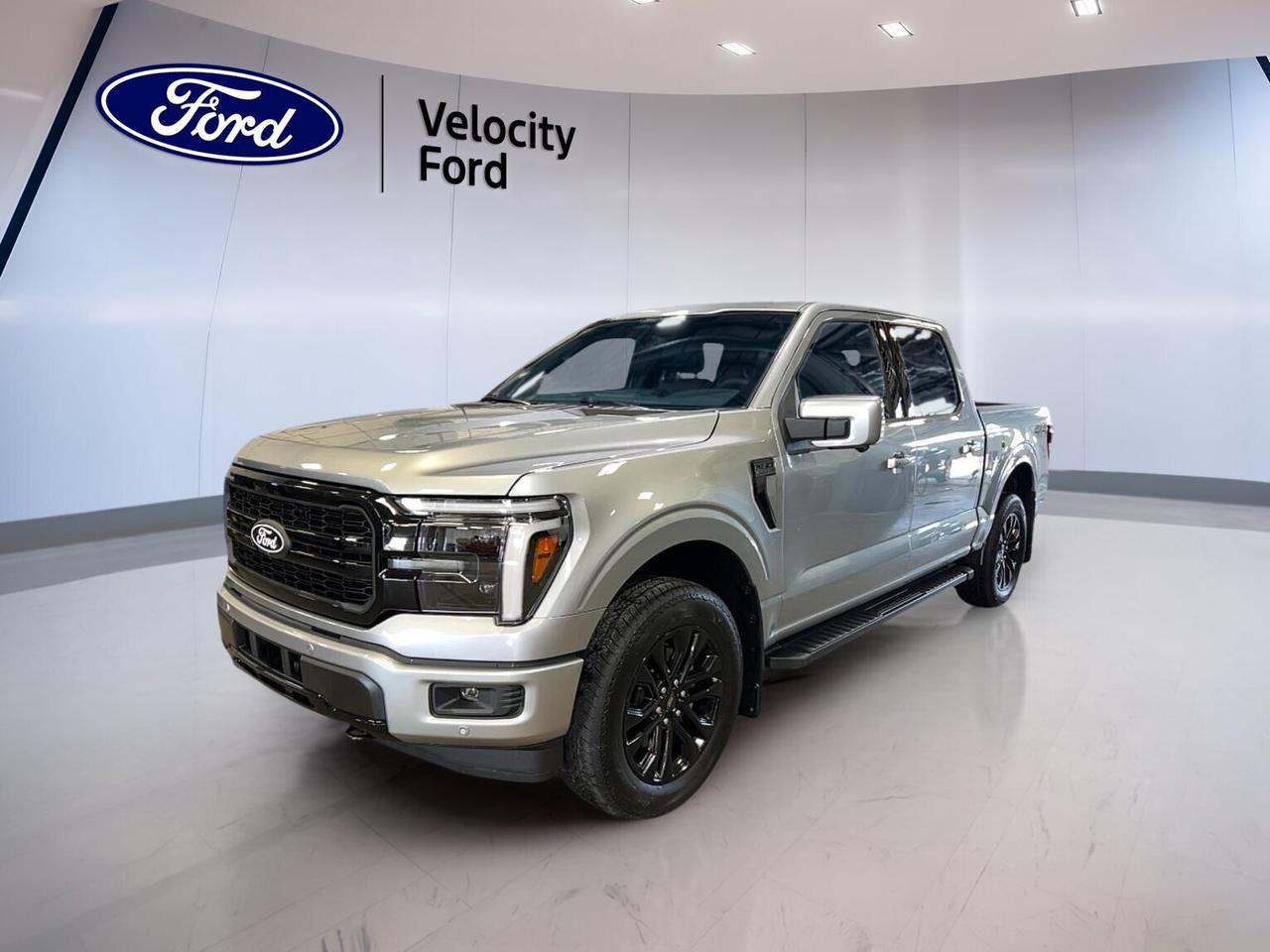 Built for hard work and easy comfort, the brand new 2026 Ford F-150 LARIAT 4WD SuperCrew 5.5 Box is ready for life in Moose Jaw. Its Silver exterior and Black interior give it a clean, modern look. With four full doors, automatic transmission, and a 3.5-litre unleaded engine, this truck brings strong everyday capability.

Sold by Velocity Ford, this new F-150 LARIAT 4WD SuperCrew 5.5 Box is a smart fit for drivers who want towing strength, useful technology, and a refined cabin. It blends proven truck toughness with features that help on the highway, at the job site, and around town in every season.

FEATURES OF THE F-150 LARIAT 4WD SuperCrew 5.5 Box
»» Silver exterior with bold truck presence
»» Black interior with upscale cabin feel
»» Four full doors for easy access
»» Automatic transmission with four-wheel drive traction

TRUCK FEATURES
»» Tows up to 4,671 kilograms confidently
»» SuperCrew cab adds roomy rear seating
»» 5.5-foot box supports daily hauling needs
»» Rear tow hook aids truck utility

ADVANCED SAFETY FEATURES
»» Backup camera helps with tight reversing
»» Lane departure warning supports safer travel
»» Blind spot monitor boosts lane awareness
»» Anti-lock brakes enhance stopping control

PERFORMANCE AND EFFICIENCY
»» 3.5-litre unleaded engine delivers strong output
»» Automatic transmission supports smooth daily driving
»» Four-wheel drive improves traction on rough roads
»» Stability control helps maintain road confidence

COMFORT AND CONVENIENCE
»» Heated front seats add cold-weather comfort
»» Dual-zone climate control keeps temperatures balanced
»» Remote starter adds convenience in winter
»» Power windows and locks simplify use

TECHNOLOGY AND CONNECTIVITY
»» Navigation system offers clear route guidance
»» Bluetooth integration supports hands-free calling
»» Wi-Fi hotspot keeps devices connected
»» Steering wheel audio controls ease access

CARGO SPACE
»» 5.5-foot bed handles gear with ease
»» Rear trunk access supports loading convenience
»» Steps help cabin and truck entry
»» Spare tire adds peace of mind

WHAT OTHER OWNERS LIKE
»» Strong towing ability for work and play
»» Comfortable cabin for long daily drives
»» Helpful tech that feels easy to use
»» Four-wheel drive confidence in poor weather

This 2026 Ford F-150 LARIAT 4WD SuperCrew 5.5 Box gives you the versatility many Canadian drivers want from a full-size pickup. Heated mirrors, electric mirrors, retractable mirrors, fog lights, LED headlamps, tinted windows, chrome wheels, and turn signal mirrors all add to its everyday appeal and visibility.

Inside, this 2026 Ford F-150 LARIAT 4WD SuperCrew 5.5 Box offers thoughtful features that make each drive easier. Enjoy memory seats, memory mirrors, adjustable pedals, lumbar support for both front occupants, push button start, HD Radio, satellite radio, auto-dimming rearview mirror, and ambient lighting for a more relaxed feel.

This 2026 Ford F-150 LARIAT 4WD SuperCrew 5.5 Boxs VIN is: 1FTFW5L85TKE39680.
