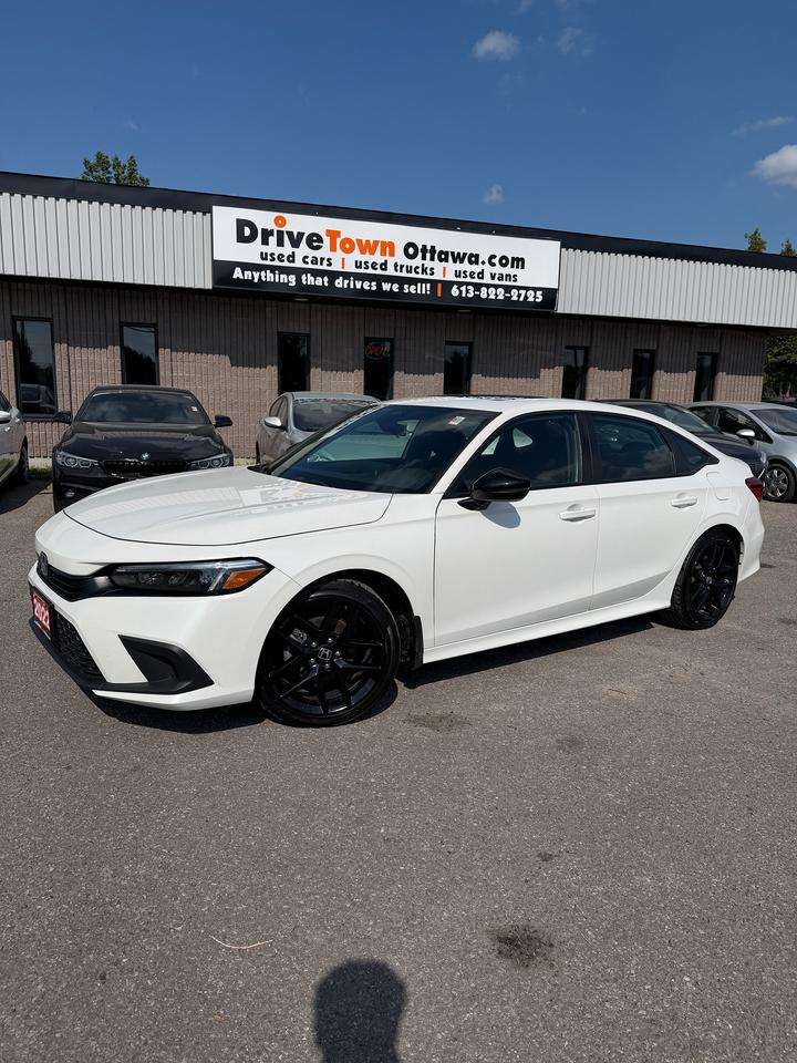 <p>2022 HONDA CIVIC SPORT WHITE - CLEAN, SPORTY & READY TO DRIVE!</p><p>REBUILT TITLE - PROFESSIONALLY REBUILT BY HONDA AND READY TO BE ENJOYED!</p><p>VERY CLEAN - SHARP LOOKING CIVIC SPORT WITH A SMOOTH, COMFORTABLE & CONFIDENT DRIVE!</p><p>FUEL-EFFICIENT GAS ENGINE - PRACTICAL, ECONOMICAL & GREAT FOR DAILY DRIVING, COMMUTING OR LONGER TRIPS!</p><p>SPORT TRIM WELL EQUIPPED WITH PRACTICAL FEATURES INCLUDING BACKUP CAMERA, BLUETOOTH, TOUCHSCREEN DISPLAY, CRUISE CONTROL, POWER WINDOWS, POWER LOCKS & SPORTY INTERIOR STYLING!</p><p>PERFECT FOR DAILY DRIVING, COMMUTING, STUDENTS, FIRST-TIME BUYERS OR ANYONE LOOKING FOR A CLEAN, MODERN & FUEL-EFFICIENT SEDAN!</p><p>EASY FINANCING AVAILABLE!</p><p>ADVERTISED PRICE IS OUR FINANCE PRICE.</p><p>DRIVETOWNOTTAWA.COM - COME VISIT US / VENEZ NOUS VISITER!</p><p>TAXES AND LICENSING EXTRA. SEE DRIVETOWNOTTAWA.COM FOR CASH PRICE. FINANCING CHARGES APPLY, INCLUDING BANK FEES, PPSA AND INTEREST. QUEBEC SAFETY FEE APPLICABLE.</p>