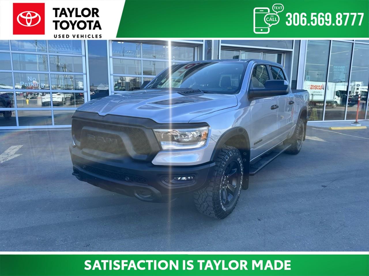 1-Year SiriusXM Subscription, 115V Rear Auxiliary Power Outlet, 12''' Touchscreen, 124.9-Litre (27.4-Gallon) Fuel Tank, 19-Speaker harman/kardon Prem Sound, 2nd Row In-Floor Storage Bins, 4 MOPAR Adjustable Cargo Tie-Down Hooks, 4-Way Front Headrests, 4G LTE Wi-Fi Hot Spot, Accent Colour Door Handles, Apple CarPlay Capable, Bed Utility Group, Black Exterior Mirrors, Black Front Bumper w/Black Plate, Black RAM Grille Badge, Bucket Seats, Comfort & Convenience Group, Connected Travel & Traffic Services, Connectivity - US/Canada, Digital Rearview Mirror w/Autodim, Disassociated Touchscreen Display, Door Trim Panel Foam Bottle Insert, Emergency Vehicle Alert System (EVAS), Exterior Mirrors w/Courtesy Lamps, Exterior Mirrors w/Memory Settings, Exterior Mirrors w/Turn Signals, For Details Visit DriveUconnect.ca, Front Heated Seats, Front Seatback Map Pockets, Full-Length Upgraded Floor Console, Global Telematics Box Module (TBM), Google Android Auto, GPS Antenna Input, GPS Navigation, Grille Moustache w/Black Outline, Hands-Free Phone Communication, HD Radio, Head-Up Display, Heated Exterior Mirrors, Heated Steering Wheel, Integrated Centre Stack Radio, LED Centre High-Mounted Stop Lamps, Luxury Leather-Faced Front Bucket Seats, Media Hub w/2 USB Charging Ports, Mirror Clearance/Running Lights, Mirror-Mounted Aux Reverse Lamps, Night Edition, Off-Road Info Pages, Park-Sense Front/Rear Park Assist w/Stop, Pick-Up Box Lighting, Power 2-Way Driver Lumbar Adjust, Power 2-Way Passenger Lumbar Adjust, Power 8-Way Driver & Passenger Seats, Power Adjustable Pedals, Power Folding Exterior Mirrors, Radio: Uconnect 5W Nav w/12.0''' Display, Rain-Sensing Windshield Wipers, Rear 60/40 Folding Seat, Rear Dome Lamp w/On/Off Switch, Rear Power Sliding Window, Rear Underseat Compartment Storage, Rear Window Defroster, Rebel Level 2 Equipment Group, Remote Proximity Keyless Entry, Remote Start System, Remote Tailgate Release, Second-Row Heated Seats, Security Alarm, SiriusXM w/360L On-Demand Content, Sun Visors w/Illuminated Vanity Mirrors, Technology Group, Trailer Brake Control, Trailer Light Check, Trailer Reverse Steering Control, Trailer Tire Pressure Monitoring, Trailer Tow Group, Trailer Tow Mirrors, Universal Garage Door Opener, USB Mobile Projection, Wheels: 18''' x 8.0''' Gloss Black, Wireless Charging Pad.<br /><br /><br />HEMI 5.7L V8 VVT 8-Speed Automatic 4WD Odometer is 43480 kilometers below market average!