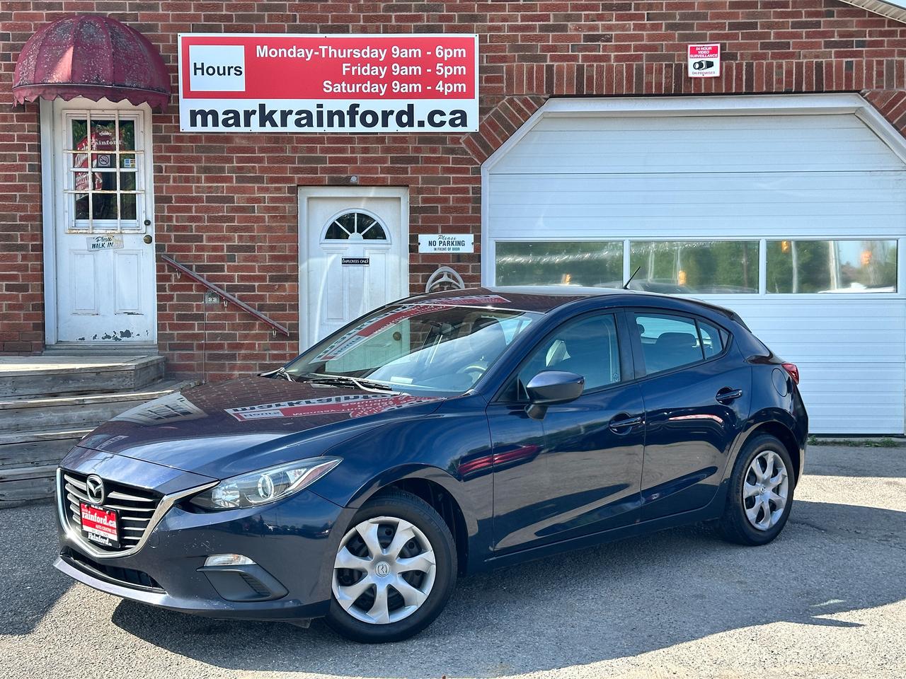 <p>Super-Clean, local Mazda MAZDA3 from Bowmanville, ON! This GX Hatchback model looks great in its Blue paint and steel wheels with factory wheel covers, with great fuel economy and all of your essential options! The exterior features keyless entry, daytime running lights, colour-matched side mirrors, sporty dual rear exhaust, a sleek rear spoiler, and a peppy, fuel-efficient 2.0L 4-cylinder Engine and Automatic transmission! The interior is clean and comfortable with cloth seating for five occupants, power door locks, windows and mirrors, comfortable rear seating and a large trunk/hatch area, all-weather floor mats, steering wheel Audio controls, an easy-to-read and use gauge cluster, push-button start, central AM/FM Radio with Bluetooth and CD Player, A/C climate controls with front and rear window defrost settings, 12V accessory ports and more!</p><p>&nbsp;</p><p>Carfax Report Attached, Great Commuter Hatchback with all of your essentials!</p><p><strong>Our price includes safety certification, NO ADMIN FEES!</strong></p><p>Call (905) 623-2906</p><p>&nbsp;</p><p>Text Ryan: (905) 429-9680 or email: ryan@markrainford.ca</p><p>&nbsp;</p><p>Text Mark: (905) 431-0966 or email: mark@markrainford.ca</p>