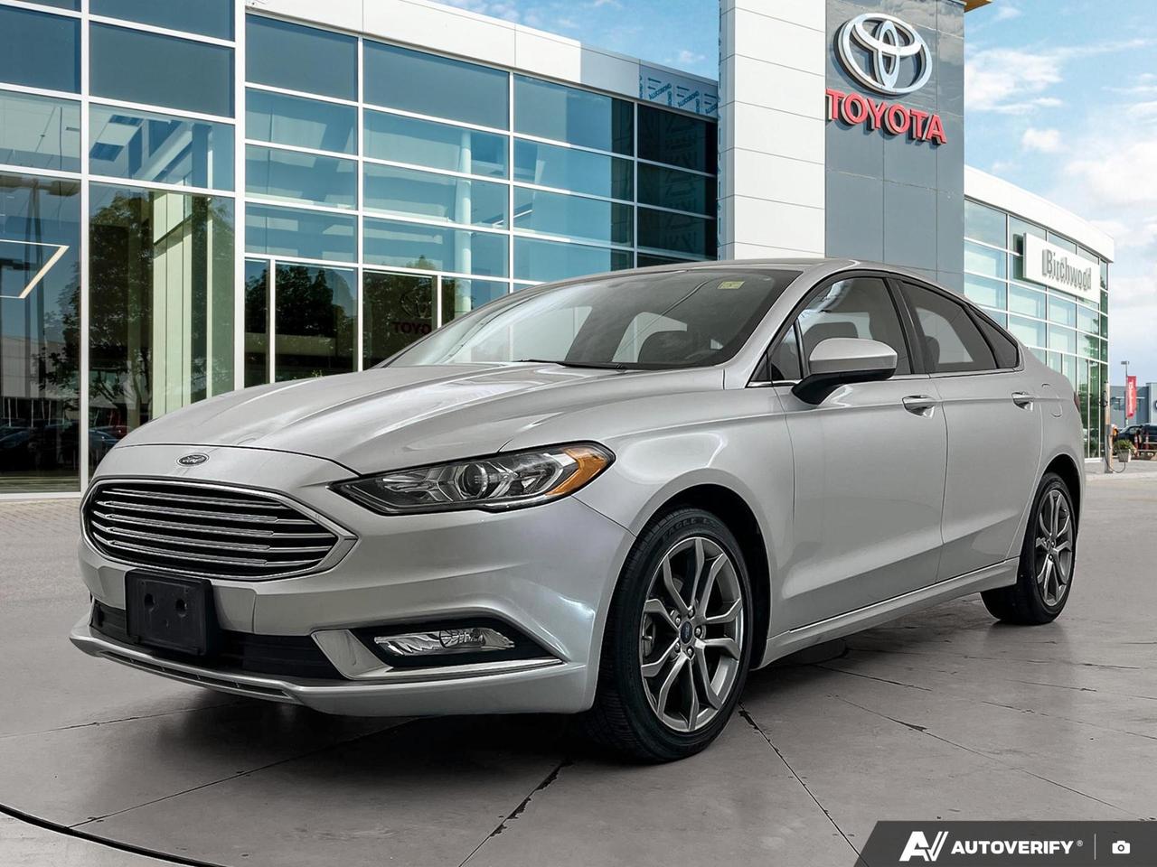 Low Kilometers!
Collision Free!
The 2017 Ford Fusion SE in Ingot Silver Metallic is a well-rounded all-wheel drive sedan that brings practical versatility and everyday confidence to your commute. With a 2.0L 4-cylinder engine paired to an automatic transmission and AWD, this Fusion is built for Manitoba roads year-round.

Key Features:
- AWD
- SE Appearance Package
- SYNC Voice Recognition 
- 4.2 Colour LCD Screen
- AM/FM Stereo/Single CD Player w/ MP3 Capability
- 6 Speakers
- Cruise Control
- App Link
- Smart-Charging USB Port
- SecuriCode Invisible Keypad

Ready to experience the Fusion for yourself? Visit Birchwood Toyota online at www.birchwoodtoyota.ca to reserve this vehicle, start your purchase, or book a test drive. Our team is happy to answer any questions and help you find the right fit.
Experience is Everything at Birchwood Toyota! Our mission is to provide the most transparent and efficient sales process for our customers. We strive to provide the best service possible, whether you visit us in person, shop our website, or take advantage of our buy from home program.

The Birchwood Toyota Trade-in Guarantee - We buy your vehicle even if you dont buy ours!


100% guaranteed approval for every qualifying year, make and model. Only the Best Rates and Terms available.

This vehicle qualifies for Birchwood Toyota Shield, which includes:

Guardian Protection:
- Cosmetic Wheel Protection
- Paintless Dent Repair
- Key/Remote Replacement

Dealer Permit #0025
Dealer permit #0025