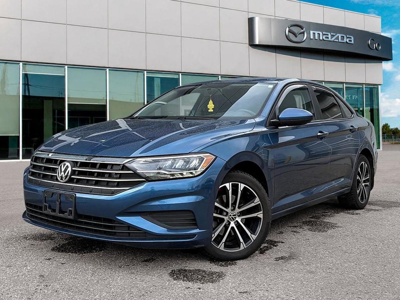 Experience efficiency, style, and comfort with this pre-owned 2020 Volkswagen Jetta Comfortline! Finished in sleek Black with matching black cloth interior, it boasts a peppy 1.4L TSI 147HP 4-cylinder engine paired with an 8-speed automatic transmission with Tiptronic for smooth, responsive driving. Stay cozy year-round with heated front seats and enjoy modern convenience through the 6.5-inch touchscreen infotainment system with wireless audio streaming and smart device mirroring. Equipped with advanced safety features like a rearview camera, electronic stability control, and multiple airbags, this Jetta delivers peace of mind on every drive. Dont miss your chance to own a stylish, reliable sedan perfect for city commutes and beyond. Visit us today for a test drive!Go Mazda is an AMVIC licensed businessThis vehicle has been registered in the province ofBritish Columbia