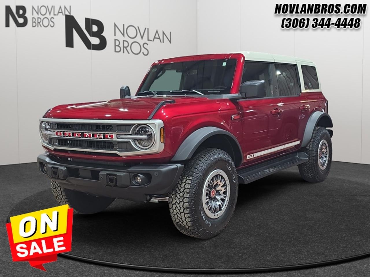 <b>360-Degree Camera, Adaptive Cruise Control!</b><br> <br> Check out our great inventory of new vehicles at Novlan Brothers!<br> <br>The 2026 Ford Bronco redefines off-road capability with bold styling, rugged build, and trail-ready purpose.<br> <br>The 2026 Ford Bronco brings adventure to life with its rugged design, intelligent features, and customizable configuration that adapts to off-road landscapes or city escapes. Inside, the cabin features durable materials, intuitive tech and seating tailored for both driver and passengers in every journey. With its strong presence, forward-thinking enhancements and Fords commitment to performance, the Bronco offers a driving experience that thrives in every terrain.<br> <br>This Ruby Red Metallic Tinted Cc SUV has a 10 Speed Automatic transmission and is powered by a 315HP 2.7L V6 Cylinder Engine. <br> <br> Our Broncos trim level is Outer Banks. Inside, heated leather-trimmed bucket seats with power adjustability, a heated leather steering wheel, and dual-zone automatic climate control create a cabin thats both comfortable and commanding. The 12-inch SYNC 4 touchscreen with wireless Apple CarPlay, Android Auto, and connected navigation keeps you seamlessly in control, while the premium audio system with seven speakers delivers crisp sound wherever the road leads. Every adventure feels effortless thanks to trail-specific systems like Trail Control, Trail Turn Assist, and Trail One-Pedal Drive. Exterior features like 18-inch bright machined aluminum wheels, removable roof panels, and body-coloured accents emphasize capability and confidence. Safety and awareness are bolstered by Ford Co-Pilot360 technologies including BLIS with Cross-Traffic Alert, Lane-Keeping Assist, Automatic Emergency Braking, and a Reverse Sensing System. Combining authentic 4x4 engineering with modern innovation, this SUV is built to perform as fearlessly as it looks, on the trail, on the road, and everywhere in between. This vehicle has been upgraded with the following features: 360-Degree Camera, Adaptive Cruise Control.<br><br> View the original window sticker for this vehicle with this url <b><a href=http://www.windowsticker.forddirect.com/windowsticker.pdf?vin=1FMEE8BP9TLB16733 target=_blank>http://www.windowsticker.forddirect.com/windowsticker.pdf?vin=1FMEE8BP9TLB16733</a></b>.<br> <br>To apply right now for financing use this link: <a href=http://novlanbros.com/credit/ target=_blank>http://novlanbros.com/credit/</a><br> <br/>Weve discounted this vehicle $8260. Total rebate of $4000 is reflected in the price. 5.99% financing for 84 months. <br> Payments from <b>$1126.61</b> monthly with $0 down for 84 months @ 5.99% APR O.A.C. ( Plus applicable taxes - Plus applicable fees ). Incentives expire 2026-08-31. See dealer for details. <br><br><br> Come by and check out our fleet of 20+ used cars and trucks and 100+ new cars and trucks for sale in Paradise Hill.  o~o