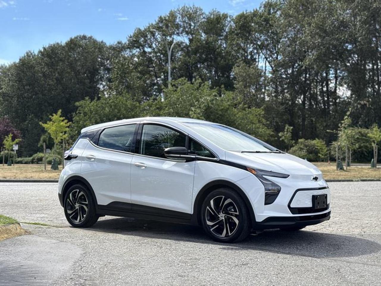 This 2023 Chevrolet Bolt EV 1LT is powered by an all-electric drivetrain paired with an automatic transmission and front-wheel drive. Designed for efficient daily commuting and urban driving, this five-door hatchback offers a practical interior, modern technology, and zero tailpipe emissions.

Equipment includes Apple CarPlay and Android Auto smartphone integration, a backup camera, heated front seats, heated steering wheel, regenerative braking, power-adjustable drivers seat, air conditioning and heat, and power windows, power door locks, and power mirrors. The hatchback design provides flexible cargo space while maintaining comfortable seating for passengers.

Finished in white with a black cloth interior, this Chevrolet Bolt EV 1LT offers an all-electric passenger vehicle with a practical combination of comfort, technology, and everyday usability. This item is currently OFFSITE. You must register an appointment with our office to schedule an offsite viewing. Appointments must be made a minimum of one business day in advance (and as defined by the days that Repo.com is open for business) before your appointment can be scheduled and confirmed. We may, at our own discretion, instead opt to transport smaller items to Repo.coms main yard for viewing purposes.  $36,780.00 plus $375 processing fee, $37,155.00 total payment obligation before taxes.   Listing report, warranty, contract commitment cancellation fee, financing available on approved credit (some limitations and exceptions may apply). All above specifications and information is considered to be accurate but is not guaranteed and no opinion or advice is given as to whether this item should be purchased. We do not allow test drives due to theft, fraud, acts of vandalism and undetectable impaired driving. Instead we provide the following benefits: Complimentary Warranty (with options to extend), Limited Money Back Satisfaction Guarantee on Fully Completed Contracts, Contract Commitment Cancellation, and an Open-Ended Sell-Back Option. Ask seller for details or call 604-522-REPO(7376) to confirm listing availability.
