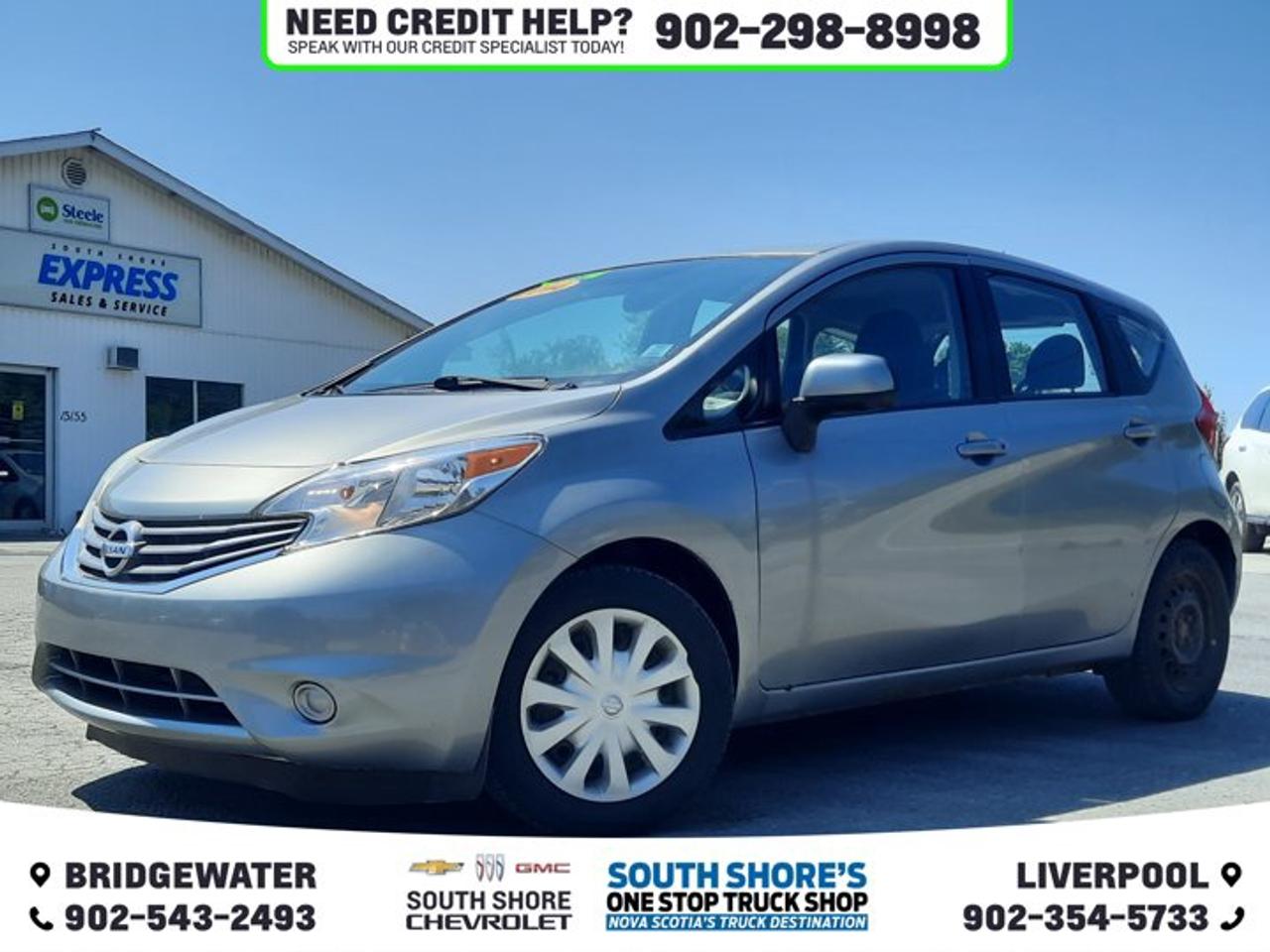 Recent Arrival! Brilliant Silver Metallic 2014 Nissan Versa Note S FWD 5-Speed Manual 1.6L 4-Cylinder DOHC 16V 4 Speakers, ABS brakes, Block heater, Brake assist, Bumpers: body-colour, CD player, Driver door bin, Front anti-roll bar, Front wheel independent suspension, Full Tank of Fuel & Floor Mats, Heated door mirrors, Power door mirrors, Power steering, Rear window defroster, Rear window wiper, Speed-sensing steering, Split folding rear seat, Tachometer, Traction control, Trip computer.