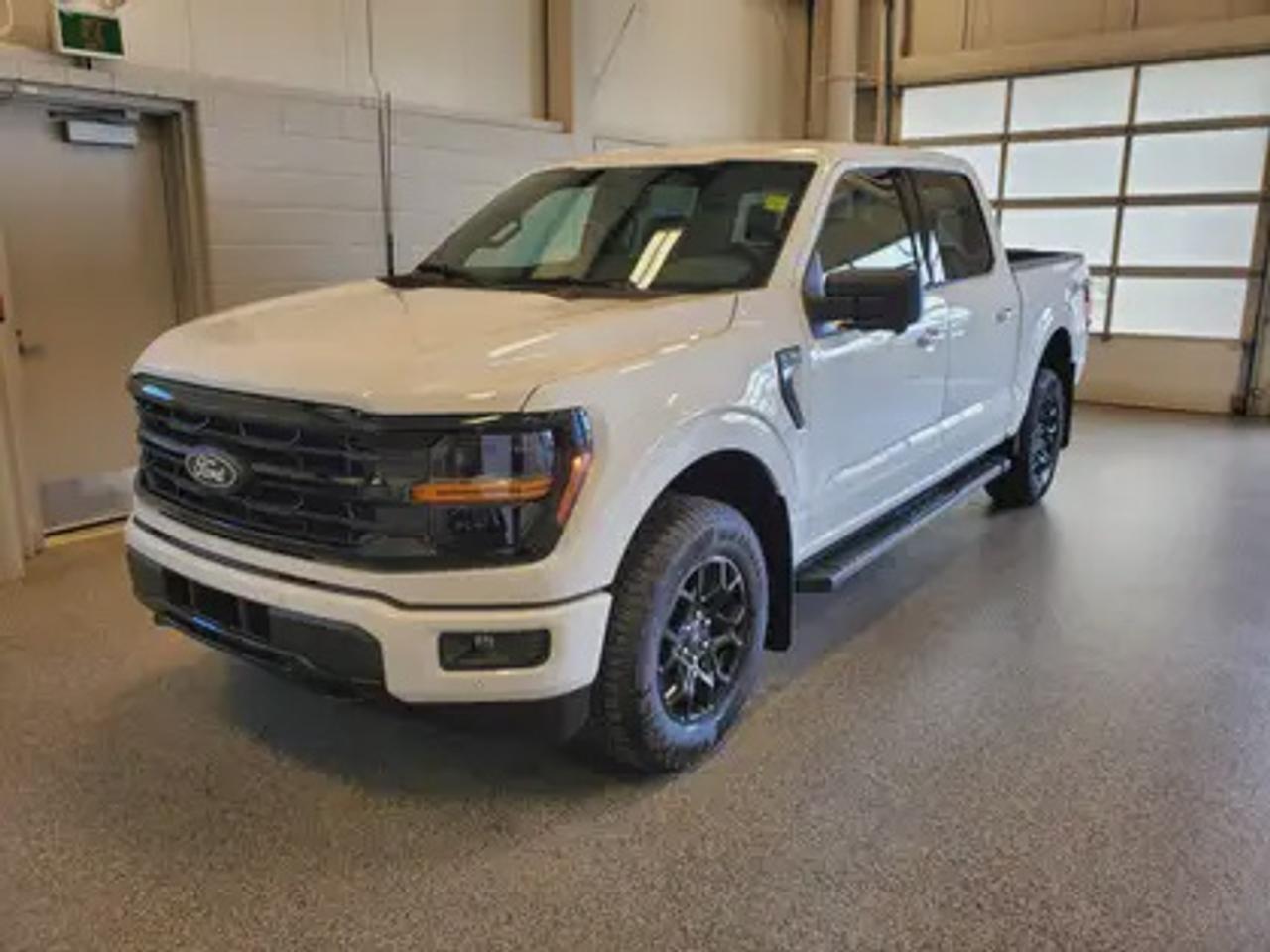 The all-new 2026 Ford F-150 XLT 302A is a statement of style in Oxford White. Powered by the 3.5L V6 engine, it delivers 400 horsepower and 500 lb-ft of torque, paired with a 10-speed automatic transmission. This truck achieves an impressive, combined fuel economy of 12.3 L/100 km (23 miles per gallon).

Key Features:
12 LCD Captivity Touchscreen
Electronic Power-Assist Steering
Dual-Zone Electronic Auto Temp Control
Cruise Control
Power Windows
AdvanceTrac® With Roll Stability Control
Perimeter Alarm
Ford Co-Pilot360
Lane Keeping System
Rear View Camera
Rear Parking Sensors
Reverse Park Assist
Class IV Trailer Hitch
Power Drivers Seat
Remote Start
SYNC®4
Apple Car Play
18 All Terrain Tires
Bluetooth Connectivity
Engine Block Heater
XLT Black Appearance Package

From navigating Saskatchewans rugged terrain to hauling gear for your next project, the 2026 Ford F-150 XLT combines capability, technology, and comfort into a trusted workhorse that adapts to your needs. Engineered for durability, the F-150 XLT offers heavy-duty shock absorbers, rear privacy glass, interior worksurface, dual exhaust tips and LED reflector headlamps. Inside, enjoy smart features like power windows, tilt/telescoping steering wheel, and USB charging ports for added convenience. Safety remains a priority with Post Collision Braking, Dynamic Brake Support, and advanced airbag systems.

Moose Jaw Ford, conveniently located at 1010 North Service Road in Moose Jaw, is your trusted destination for all your automotive needs. With an impressive 4.8-star Google rating from nearly 1,500 reviews, we are proud to deliver an exceptional vehicle-buying experience tailored just for you. Our Moose Jaw Motives set us apart, offering unbeatable value like half-priced oil changes for life on pre-owned vehicles, one year of key and remote protection, and one year of tire and rim protection. Enjoy peace of mind with every purchase. At Moose Jaw Ford, were committed to driving positive change in our community by combining exceptional service, high-quality vehicles, and a guest-first approach. Visit us today!