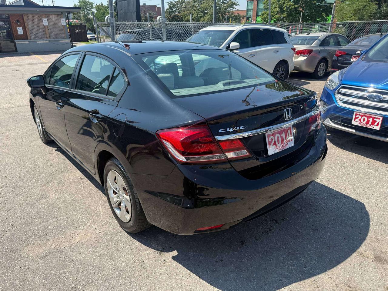 2014 Honda Civic Sedan *** 3 YEAR WARRANTY INCLUDED *** Photo
