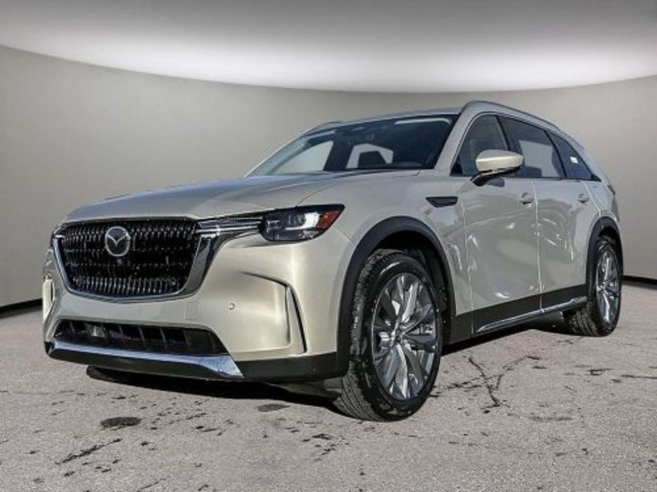 Introducing the 2026 Mazda CX-90 MHEV GT AWD  where luxury meets cutting-edge hybrid performance. Powered by a 3.3L turbocharged e-SKYACTIV G inline-6 engine paired with an 8-speed automatic transmission and AWD, this SUV delivers exhilarating power with efficiency. Glide on 21 Silver Metallic alloy wheels and enjoy a sophisticated Black leather interior with heated and ventilated front seats for ultimate comfort.Stay connected and entertained with the Bose premium sound system and 12.3-inch touchscreen featuring integrated navigation. Safety comes standard with advanced driver aids like blind spot monitoring, forward collision mitigation, and a suite of 10 airbags. Experience seamless control via driver-selectable drivetrain modes and the advanced MHEV mild-hybrid system.Elevate every drivewhether city streets or off-road adventureswith the 2026 Mazda CX-90 MHEV GT AWD. Visit Go Mazda today to test drive innovation in motion!Go Mazda is an AMVIC licensed business