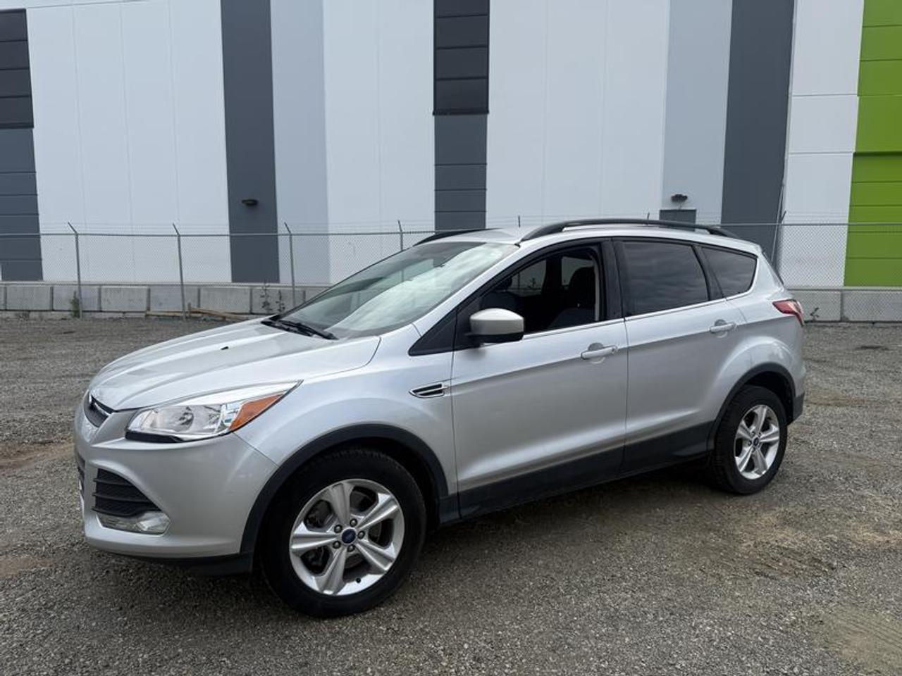 2014 Ford Escape SE 4WD, 1.6L EcoBoost, Automatic, 1.6L, 4 door, automatic, 4WD, 4-Wheel ABS, cruise control, air conditioning, AM/FM radio, CD player, navigation aid, power door locks, power windows, silver exterior, black interior. (This listing a a former government fleet asset)  $17,390.00 plus $375 processing fee, $17,765.00 total payment obligation before taxes.   Listing report, warranty, contract commitment cancellation fee, financing available on approved credit (some limitations and exceptions may apply). All above specifications and information is considered to be accurate but is not guaranteed and no opinion or advice is given as to whether this item should be purchased. We do not allow test drives due to theft, fraud, acts of vandalism and undetectable impaired driving. Instead we provide the following benefits: Complimentary Warranty (with options to extend), Limited Money Back Satisfaction Guarantee on Fully Completed Contracts, Contract Commitment Cancellation, and an Open-Ended Sell-Back Option. Ask seller for details or call 604-522-REPO(7376) to confirm listing availability.