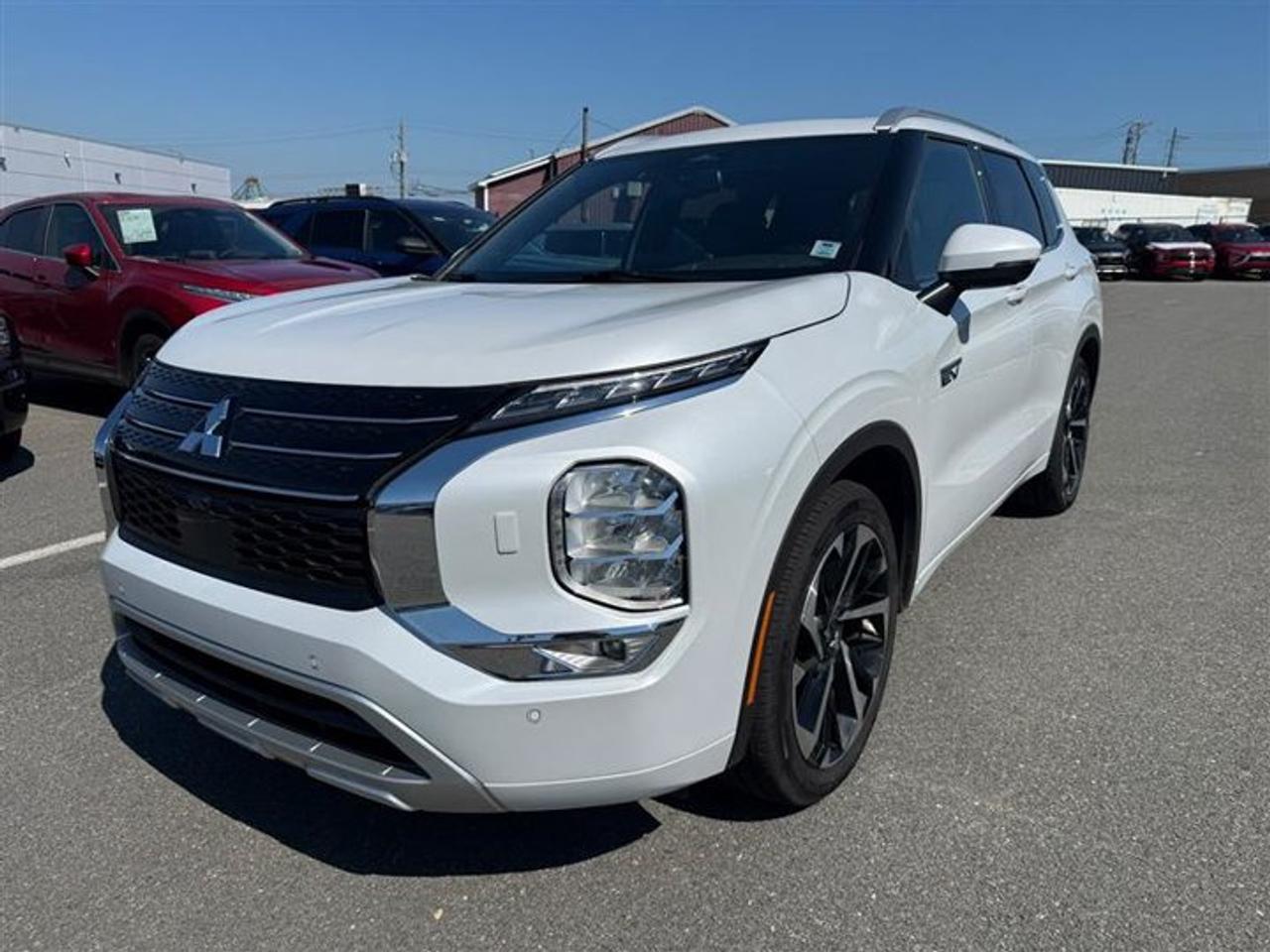Recent Arrival! 2023 Mitsubishi Outlander PHEV GT 2.4L I4 DOHC MIVEC, 3rd row seats: split-bench, GT Premium Package, Heads-Up Display, Heated front seats, Heated rear seats, Heated steering wheel, Massage Function For Front Seats, Memory seat, Navigation system: Powered by TOMTOM, Power driver seat, Power Liftgate, Power moonroof, Premium Package (P1), Semi-Aniline Quilted Leather-Appointed Seats.White Diamond 2023 Mitsubishi Outlander PHEV GT 4WD 1-Speed Automatic 2.4L I4 DOHC MIVECSteele Mitsubishi has the largest and most diverse selection of preowned vehicles in HRM. Buy with confidence, knowing we use fair market pricing guaranteeing the absolute best value in all of our pre owned inventory!Steele Auto Group is one of the most diversified group of automobile dealerships in Canada, with 60 dealerships selling 29 brands and an employee base of well over 2300. Sales are up over last year and our plan going forward is to expand further into Atlantic Canada and the United States furthering our commitment to our Canadian customers as well as welcoming our new customers in the USA.