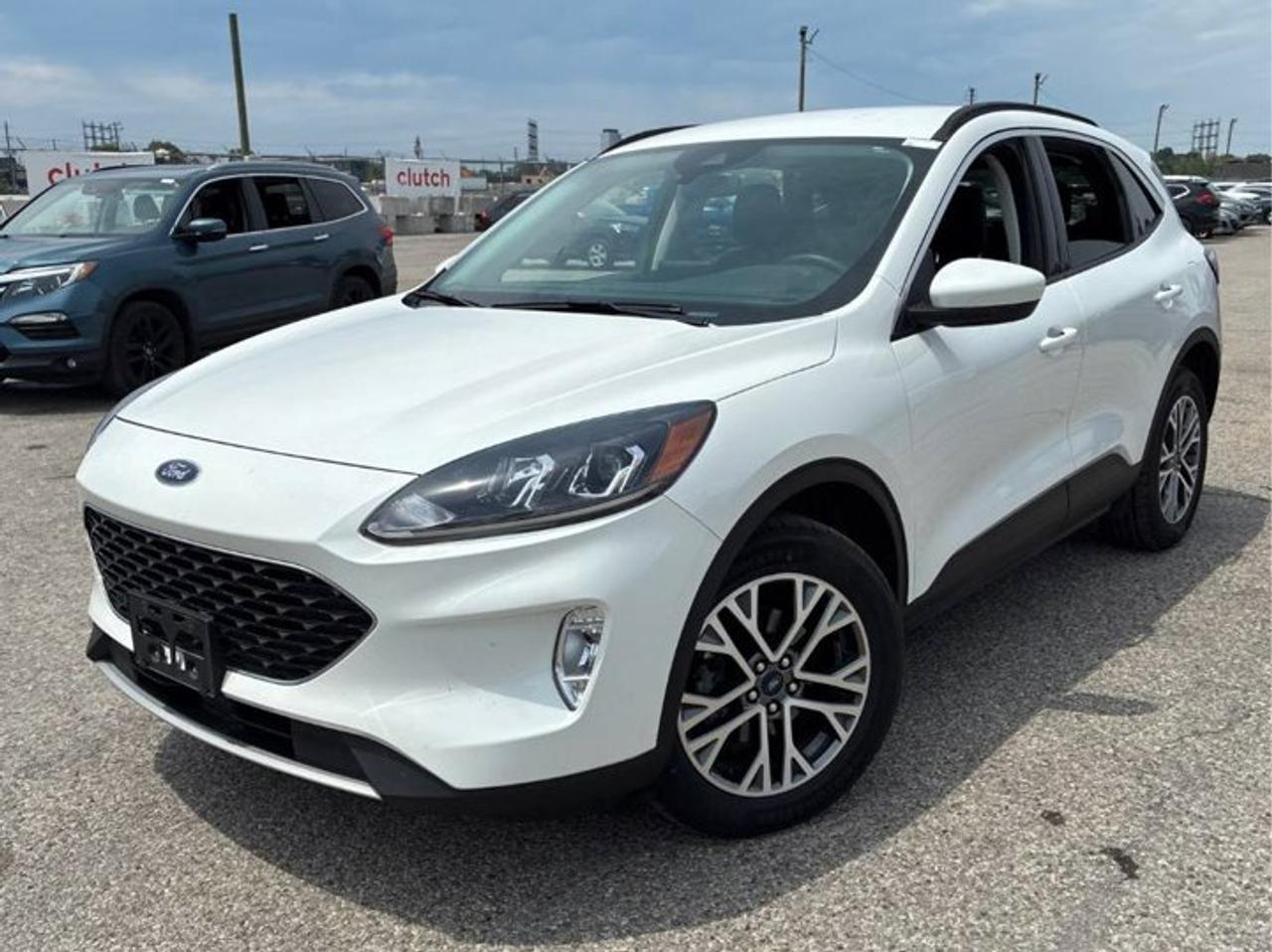Come see this certified 2021 Ford Escape SEL AWD | Leather | Navi | Heated Seats + Steering | Adaptive Cruise | Remote Start | and More !. Its Automatic transmission and 1.5 L engine will keep you going. This Ford Escape has the following options: Reverse Camera, Remote Start, Navigation System, Leather, Heated Steering Wheel, Apple Car Play, Air Conditioning, Adaptive Cruise, Heated Seats, and Tilt Steering Wheel. See it for yourself at Mark Wilsons Better Used Cars, 5055 Whitelaw Road, Guelph, ON N1H 6J4.MASSIVE SELECTION: 500+ vehicles in ONE LOCATION, all Live Market Priced for the best value!STRAIGHTFORWARD & TRANSPARENT PRICING: Our Advertised Price INCLUDES:Safety Certification! (No separate certification fee upcharge).FREE Carfax History Report!NO upcharge for paying cash!CONFIDENCE & PEACE OF MIND: 30-Day/3,000 km Warranty INCLUDED! Plus a 5-Day Exchange Privilege!*EASY FINANCING: Better-than-bank rates, $0 Down, and 3 Months No Payments available OAC. BAD CREDIT APPROVED HERE!WE BUY CARS: Get Top Dollar for your trade, or sell us your vehicle for CASH even if you dont buy ours!www.shopwilsons.comAn Honest, Transparent Buying Experience. Trusted in business since 1961!(Cash Prices Exclude HST and Licensing Fees only.)