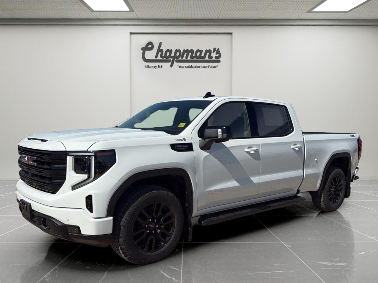 <p>Finished in Summit White with a Jet Black interior, this Sierra 1500 Elevation combines bold styling, premium comfort, and serious truck capability. Its spacious Crew Cab and standard bed provide plenty of room for passengers, cargo, and everyday work.</p><p>A 5.3L EcoTec3 V8, 10-speed automatic transmission, and four-wheel drive deliver confident power, while the off-road suspension, skid plates, and all-terrain tires help it handle challenging conditions.</p><h3>Performance & Capability</h3><ul><li><p>5.3L EcoTec3 V8 engine</p></li><li><p>10-speed automatic transmission</p></li><li><p>Two-speed AutoTrac transfer case</p></li><li><p>Automatic locking rear differential</p></li><li><p>Off-road suspension</p></li><li><p>Skid plates and Hill Descent Control</p></li><li><p>Heavy-duty air filter</p></li><li><p>Integrated trailer brake controller</p></li><li><p>In-vehicle trailering app</p></li><li><p>Hitch View</p></li><li><p>Trailer Sway Control</p></li><li><p>Dual exhaust system</p></li><li><p>Engine block heater</p></li></ul><h3>Interior Comfort & Convenience</h3><ul><li><p>Leather-appointed front bucket seats</p></li><li><p>Heated front seats</p></li><li><p>10-way power drivers seat</p></li><li><p>Heated leather-wrapped steering wheel</p></li><li><p>Dual-zone automatic climate control</p></li><li><p>Centre console</p></li><li><p>Rear under-seat storage</p></li><li><p>Power-sliding rear window</p></li><li><p>Universal Home Remote</p></li><li><p>All-weather floor liners</p></li><li><p>Remote vehicle start</p></li></ul><h3>Technology & Connectivity</h3><ul><li><p>13.4-inch GMC Premium Infotainment touchscreen</p></li><li><p>Google built-in with navigation capability</p></li><li><p>Wireless Apple CarPlay and Android Auto</p></li><li><p>12.3-inch digital driver information centre</p></li><li><p>Bose premium audio system</p></li><li><p>Wireless phone charging</p></li><li><p>120-volt cabin and cargo-bed power outlets</p></li><li><p>Keyless Open and Start</p></li><li><p>OnStar Basics</p></li></ul><h3>Safety & Driver Assistance</h3><ul><li><p>HD Surround Vision</p></li><li><p>Adaptive Cruise Control</p></li><li><p>Front and Rear Park Assist</p></li><li><p>Trailer Side Blind Zone Alert</p></li><li><p>Rear Cross Traffic Braking</p></li><li><p>Rear Pedestrian Alert</p></li><li><p>Automatic Emergency Braking</p></li><li><p>Forward Collision Alert</p></li><li><p>Front Pedestrian Braking</p></li><li><p>Lane Keep Assist with Lane Departure Warning</p></li><li><p>Following Distance Indicator</p></li><li><p>IntelliBeam automatic high beams</p></li><li><p>Trailer camera provisions</p></li></ul><h3>Exterior Highlights</h3><ul><li><p>Power sunroof</p></li><li><p>20-inch all-terrain tires</p></li><li><p>Black six-inch assist steps</p></li><li><p>Factory spray-on bedliner</p></li><li><p>Rear wheelhouse liners</p></li><li><p>EZ Lift power-locking and release tailgate</p></li><li><p>LED headlamps and fog lamps</p></li><li><p>LED cargo-area lighting</p></li><li><p>Power-adjustable heated mirrors</p></li><li><p>Perimeter lighting</p></li></ul><p>2 Year/24,000 kilometer* Complimentary Oil Changes (2 total)</p><p>3 Year/60,000 kilometer* Base Warranty Coverage</p><p>5 Year/100,000 kilometer* Powertrain Component Warranty Coverage</p><p>5 Year/100,000 kilometer* Courtesy Transportation and 24/7 Roadside Assistance</p><p>6 Year/160,000 kilometer* Sheet Metal (Rust Through) Perforation Warranty Coverage</p><p>*Whichever Comes First.</p><p>Price Includes HD Flaps & 6 Tube Steps.</p><p>Price Includes Dealer Fee.</p><p>Price Excludes PST & GST.</p><p>Financing Options Available, Call For More Details.</p> <p><strong>*While every reasonable effort is made to ensure the accuracy of this information, we are not responsible for any error or omissions contained on these pages. Please verify any information in question with Chapman Motors Ltd.</strong></p>