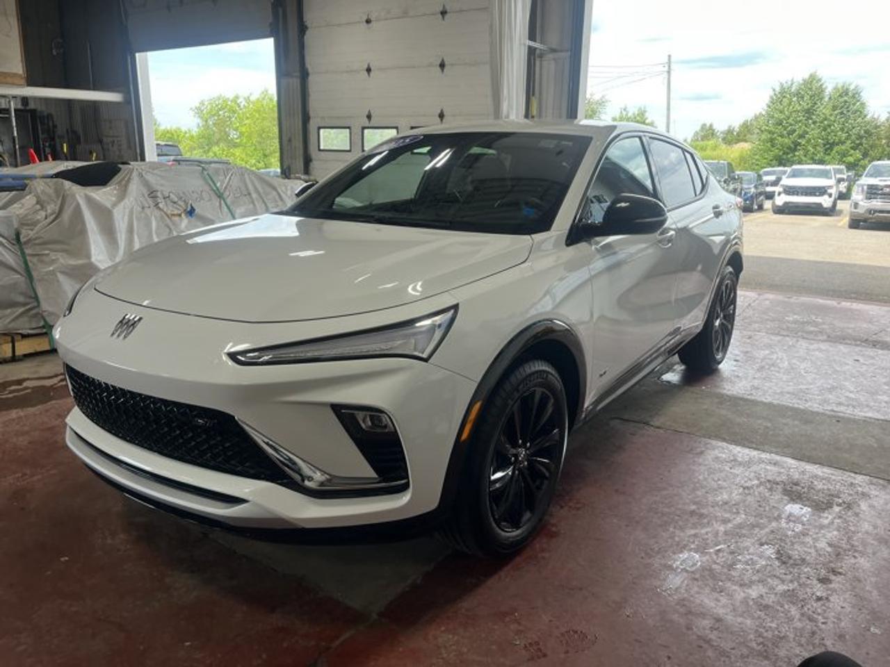 New Price!CARFAX Canada No Reported AccidentsSummit White 2025 Buick Envista Sport Touring FWD 6-Speed Automatic ECOTEC 1.2L Turbo2 USB Ports (1 Type-A, 1 Type-C), 2-Way Power Driver Lumbar Control Seat Adjuster, 3.50 Final Drive Axle Ratio, 4-Way Manual Front Passenger Seat Adjuster, 4-Wheel Disc Brakes, 6 Speakers, 8-Way Power Driver Seat Adjuster, ABS brakes, Air Conditioning, Alloy wheels, AM/FM radio: SiriusXM, Auto High-beam Headlights, Automatic temperature control, Brake assist, Bumpers: body-colour, Compass, Convenience II Package, Delay-off headlights, Driver door bin, Driver vanity mirror, Dual front impact airbags, Dual front side impact airbags, Electronic Stability Control, Emergency communication system: OnStar and Buick connected services capable, Engine Block Heater, Front anti-roll bar, Front Bucket Seats, Front Intermittent Rainsense Wipers, Front License Plate Bracket BC/MB/ON, Front reading lights, Front wheel independent suspension, Fully automatic headlights, Heated door mirrors, Heated Driver and Front Passenger Seats, Heated front seats, Heated steering wheel, Illuminated entry, Leatherette Seat Trim, Low tire pressure warning, Occupant sensing airbag, Outside temperature display, Overhead airbag, Overhead console, Panic alarm, Passenger door bin, Passenger vanity mirror, Power door mirrors, Power driver seat, Power Liftgate, Power steering, Power windows, Preferred Equipment Group G03, Premium 6-Speaker Audio System Feature, Radio data system, Radio: AM/FM Stereo Audio System, Rear Parking Sensors, Rear window defroster, Remote keyless entry, Security system, SiriusXM Trial Subscription, Speed control, Split folding rear seat, Steering wheel mounted audio controls, Tachometer, Telescoping steering wheel, Tilt steering wheel, Traction control, Trip computer, Turn signal indicator mirrors, Variably intermittent wipers, Wheels: 18 Black Painted Aluminum, Wireless Apple CarPlay/Wireless Android Auto, Wireless Charging.At Steele GMC Buick Fredericton, were proud to be your Used Car Mega Center serving drivers all across Atlantic Canada from Fredericton, Oromocto, New Maryland, Woodstock, Saint John, and Moncton in New Brunswick, to Nova Scotia, Prince Edward Island, and Newfoundland. Our inventory features all makes and models of used cars, trucks, SUVs, and vans, giving you the best selection in the region. Whether you need a fuel-efficient sedan, a family SUV, or a rugged pickup, youll find it right here at Steele GMC Buick Fredericton. With our Market Value Pricing, every vehicle is priced based on real-time market conditions, ensuring you get the best possible deal without the hassle of negotiating. We keep pricing transparent and competitive so you can shop with total confidence. No matter your credit situation good, bad, or no credit at all youre approved. Our finance experts work with lenders across Atlantic Canada to find the best terms for your budget, including second-chance financing, newcomer programs, and credit rebuilding solutions. As part of Steele Auto Group, Atlantic Canadas most diversified automotive group with 47 dealerships representing 27 brands, we offer unmatched selection, buying power, and customer support. That means if the vehicle you want isnt on our Fredericton lot, we can source it quickly from our massive dealer network across the Maritimes. When it comes to used vehicles, Steele GMC Buick Fredericton is the destination for drivers all across Atlantic Canada delivering market value pricing, every make and model, and guaranteed credit approval so you can get on the road with confidence.Steele Auto Group is the most diversified group of automobile dealerships in Atlantic Canada, with 47 dealerships selling 27 brands and an employee base of well over 2300.