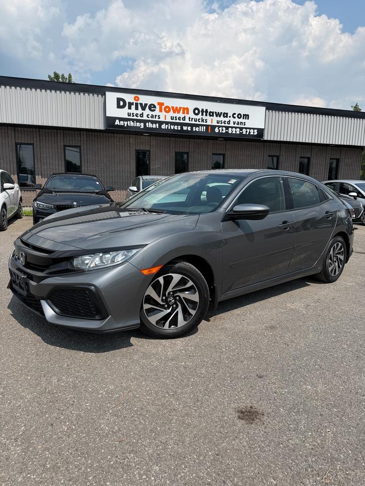 <p>2017 HONDA CIVIC LX 5DR MANUAL - CLEAN, SPORTY & FUN TO DRIVE!</p><p>VERY CLEAN - SHARP LOOKING CIVIC LX WITH A SMOOTH, RESPONSIVE & CONFIDENT DRIVE!</p><p>MANUAL TRANSMISSION + FRONT WHEEL DRIVE - FUN TO DRIVE, FUEL-EFFICIENT & GREAT FOR DAILY COMMUTING!</p><p>LX TRIM WELL EQUIPPED WITH PRACTICAL FEATURES INCLUDING BACKUP CAMERA, BLUETOOTH, CRUISE CONTROL, POWER WINDOWS, POWER LOCKS & A COMFORTABLE INTERIOR!</p><p>5-DOOR DESIGN GIVES YOU EXTRA PRACTICALITY WITH GREAT CARGO SPACE WHILE STILL KEEPING THE SPORTY CIVIC FEEL!</p><p>PERFECT FOR DAILY DRIVING, COMMUTING, STUDENTS, FIRST-TIME BUYERS OR ANYONE LOOKING FOR A CLEAN, ECONOMICAL & FUN MANUAL VEHICLE!</p><p>EASY FINANCING AVAILABLE!</p><p>ADVERTISED PRICE IS OUR FINANCE PRICE.</p><p>DRIVETOWNOTTAWA.COM - COME VISIT US / VENEZ NOUS VISITER!</p><p>TAXES AND LICENSING EXTRA. SEE DRIVETOWNOTTAWA.COM FOR CASH PRICE. FINANCING CHARGES APPLY, INCLUDING BANK FEES, PPSA AND INTEREST. QUEBEC SAFETY FEE APPLICABLE.</p>