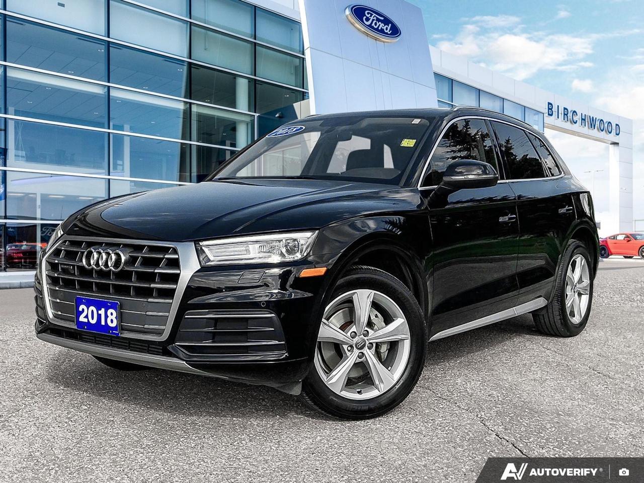 If youre looking for a refined, capable SUV that delivers German engineering with everyday practicality, this 2018 Audi Q5 Progressiv in Brilliant Black is worth your full attention. With a 7-speed S tronic automatic transmission, Quattro AWD, and a long list of premium features, this Q5 strikes the right balance between performance and comfort.

Key Features:
- Brilliant Black exterior with Black leather interior  a sharp, purposeful combination
- Panoramic sunroof with power sunshade for an open, airy cabin feel
- Heated leather steering wheel with HomeLink garage door transmitter
- Power liftgate with proximity cargo access for hands-free convenience
- Body-coloured power folding, heated, and auto-dimming side mirrors with turn signal indicators
- Programmable auto-leveling HID headlamps with daytime running lights
- Smart Device Integration for seamless connectivity on the go
- 40-20-40 split-folding rear seat for flexible cargo and passenger configurations

Safety Features:
- Front and rear parking sensors with back-up camera
- Forward collision warning system
- Side curtain airbags for 1st and 2nd rows
- Hill descent and hill hold control
- Low tire pressure monitoring

At 58,644 km, this Q5 has plenty of life left and is priced to move. Visit Birchwood Ford online at www.birchwoodford.ca to reserve this vehicle, start your purchase, or book a test drive  our team is here to make the process straightforward and pressure-free.
Birchwood Ford on Regent is the Home of Market Value Pricing.


Reconditioning our Pre-Owned Inventory is a source of pride for us! We complete an extremely thorough process both mechanically and cosmetically before it passes our standard. Our customers can shop with confidence knowing Birchwood Ford has won AutoTraders 2024 Best Priced Dealer Award. Transparency is what you deserve! 

When purchasing a pre-owned vehicle from us we will share all of the information on the vehicle. Including CARFAX, a copy of all the inspections we performed, a copy of the invoices showing you exactly what we did & spent on reconditioning the vehicle.



Call us at 204-661-9555or go to WWW.BIRCHWOODFORD.CA to browse our inventory! 

People who Try Birchwood Ford Buy from Birchwood Ford!   

       

Dealer permit #4454
Dealer permit #4454