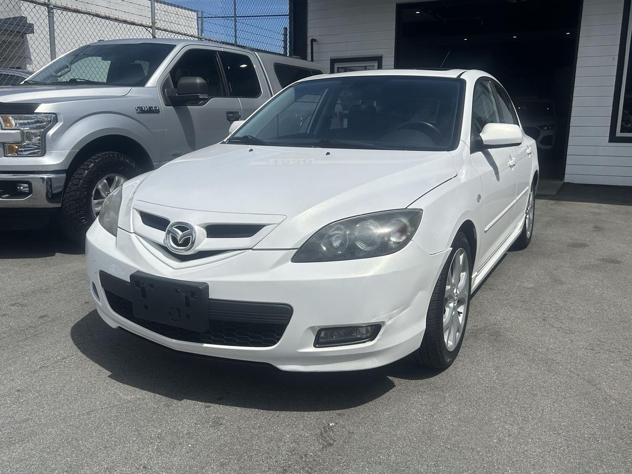 <p>Get behind the wheel of this spirited 2008 Mazda MAZDA3 GT sedan from Milani Auto Sales and experience a drive thats both engaging and practical. This well-maintained gem offers a fantastic blend of sporty performance and everyday usability, making it an ideal choice for anyone seeking a reliable and fun-to-drive vehicle. With its sleek design and comfortable interior, the MAZDA3 GT has always been a favourite for those who appreciate quality engineering and a dynamic driving experience.</p><p>This particular 2008 MAZDA3 GT boasts a front-wheel-drive setup and a smooth automatic transmission, ensuring effortless cruising on your daily commute or weekend adventures. Its a 4-door sedan, providing ample space for passengers and cargo, all powered by a gasoline engine that delivers satisfying responsiveness. With 212,000 kilometers on the odometer, this vehicle has proven its durability and readiness for many more miles of enjoyment.</p><p>Here are five sizzling features of this 2008 Mazda MAZDA3 GT:</p><ul><li><strong>Engaging GT Trim:</strong> Experience the refined performance and premium touches that the GT trim is known for, elevating your daily drive.</li><li><strong>Smooth Automatic Transmission:</strong> Enjoy seamless gear changes for a relaxed and comfortable driving experience, perfect for city traffic or highway cruising.</li><li><strong>Sporty Mazda Handling:</strong> Discover the legendary agility and responsive steering that makes every turn a joy, synonymous with the Mazda driving ethos.</li><li><strong>Practical 4-Door Sedan Design:</strong> Easily accommodate friends and family with its convenient four-door configuration and generous interior space.</li><li><strong>Proven Reliability of the MAZDA3 Platform:</strong> This model is renowned for its longevity and dependable performance, offering peace of mind for the road ahead.</li></ul><p><strong><em>Powered by AutoIntelligence&trade;</em></strong></p><p>Vehicle information has been generated using artificial intelligence and is provided for informational purposes only. While efforts are made to ensure accuracy, please confirm all details directly with the dealer.</p>