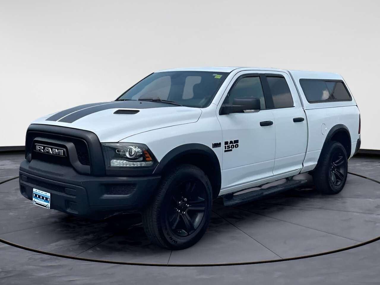 Introducing the bold and powerful 2022 Ram 1500 Classic Warlock in a dazzling 4x4 drivetrain. This truck is designed for those who crave performance and reliability, delivering outstanding handling on all types of terrain.The exterior of the Ram 1500 Classic Warlock is nothing short of impressive, featuring alloy wheels that complement its robust styling. Its rugged design is not just about looks - the truck is built for durability and strength. Step inside to a spacious and comfortable cabin equipped with power windows and highlighted by modern touches, making every journey a pleasure.Stay connected and secure with advanced technology features, including a backup camera and Bluetooth connection for seamless connectivity. Safety is a priority with brake assist and parking sensors ensuring peace of mind. The inclusion of heated mirrors is perfect for those chilly Canadian mornings.This vehicle is ideal for adventurers and those with active lifestyles who need a vehicle that can keep up with their demands. Whether youre hauling loads or navigating city streets, the Ram 1500 Classic Warlock is up for the task. Contact Windsor Chrysler today to learn more about this exceptional truck and seize the opportunity to make it yours.