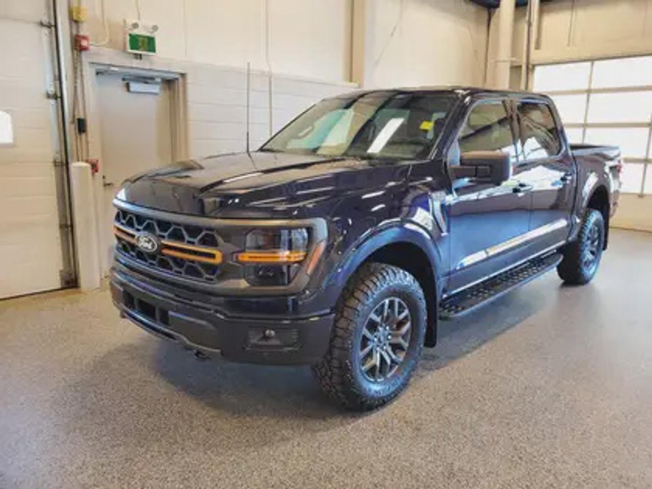 The all-new 2026 Ford F-150 Tremor 401A looks absolutely stunning in Antimatter Blue Metallic. This pickup comes with the 3.5L EcoBoost® engine, delivering an impressive 400 horsepower and 500 lb-ft of torque. With EcoBoost® technology and a 10-speed automatic transmission, this truck achieves a highway/city fuel economy of 12.9L/100km (22 miles per gallon) combined highway/city. 

Key Features:
Selectable Drive Modes
18 Alloy W/ Dark Matte Finish Wheels
Heated Front Seats
Ford Co-Pilot 360 Assist 2.0
Adaptive Cruise Control
Lane Centering
Evasive Steering Assist
Front Parking Sensors
Pro Trailer Backup Assist
Pro Trailer Hitch Assist
BlueCruise
8 Speaker B&O Sound System
Hill Descent Control
Remote Start System
Engine Block Heater
Tow/Haul Package

Moose Jaw Ford, conveniently located at 1010 North Service Road in Moose Jaw, is your trusted destination for all your automotive needs. With an impressive 4.8-star Google rating from nearly 1,500 reviews, we are proud to deliver an exceptional vehicle-buying experience tailored just for you. Our Moose Jaw Motives set us apart, offering unbeatable value like half-priced oil changes for life on pre-owned vehicles, one year of key and remote protection, and one year of tire and rim protection. Enjoy peace of mind with every purchase. At Moose Jaw Ford, were committed to driving positive change in our community by combining exceptional service, high-quality vehicles, and a guest-first approach. Visit us today!