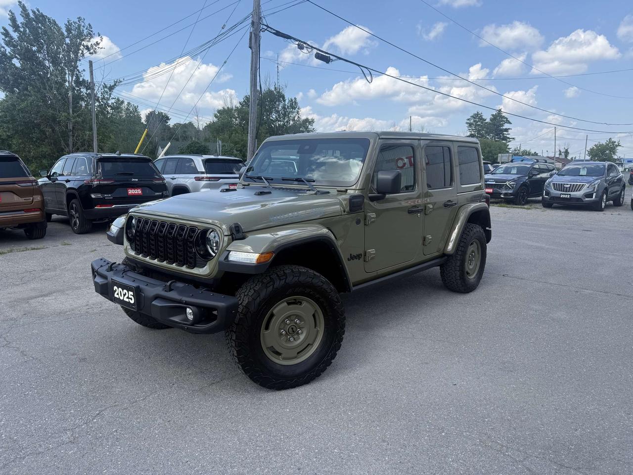 2025 JEEP WRANGLER 41 WILLYS 4XE.  FORMER DEALER DEMO!  2.0L TURBO PHEV ENGINE WITH 8 SPEED AUTO TRANSMISSION.  12.3" SCREEN WITH APPLE CARPLAY OR ANDROID AUTO, TRAILER TOW & HD ELECTRICAL GROUP, HEATED SEATS & STEERING WHEEL, REMOTE START, 4.10 REAR AXLE RATIO, E-LOCKER REAR AXLE, MOPAR ALL WEATHER FLOOR MATS, DUAL ZONE CLIMATE CONTROL, DUAL ZONE CLIMATE CONTROL, LED LIGHTS, 3 PIECE HARDTOP, ADAPTIVE CRUISE CONTROL, FORWARD COLLISION WARNING PLUS, ADVANCED BRAKE ASSIST, DANA M210 WIDE HD TUBE FRONT AXLE, DANA M220 WIDE REAR AXLE, UNIVERSAL GARAGE DOOR OPENER, WILLYS SUSPENSION, & MORE!  ONLY HST EXTRA.