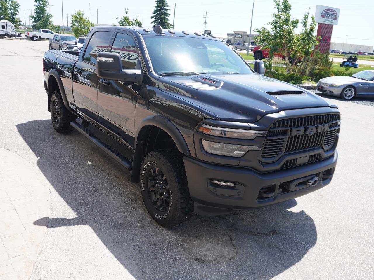 *** Dealer arranged financing on site! Quick, Simple, no calls or waiting on bank appointments required!! Drive away today ***   NO ADMINISTRATION FEES!!*** Dealer arranged financing on site! Quick, Simple, no calls or waiting on bank appointments required!! Drive away today ***  

2026 POWER WAGON   ** REBEL EDITION **  With almost $25,000.00 of factory options and upgrades!!!  New MSRP was $131,000 with tax!!   Every Power Wagon is not created equally&hellip;&hellip;&hellip;.This truck is loaded to the max!!     Note the Rebel edition offers significant improvements in PAYLOAD  and  HEAVY DUTY TOWING!!  

ABSOUTLEY as new!! Flawless Diamond Black Crystal exterior with Mopar Racer Decal package. Natura-Plus Black leather seats with contrasting Power Wagon stitching --- Power Sun Roof&mdash;Surround View Cameras --- Premium high-tech luxury technology package ---  Massive 14.4 inch touchscreen PLUS large  Front Passenger interactive media center and 12 inch gauge cluster!!  This is the combination of a Workhorse functionality combined with the &lsquo;looks&rsquo; of a gorgeous &lsquo; Off Road &lsquo; truck wrapped up in the luxuriousness of an exotic Sports car!!  

No cost has been spared in building this rig!  Factory plastic still remains on the info center. RamBox Cargo Management System  plus truck bed cargo divider / with cargo tie downs. Review the option list provided below and view the picture portfolio to note the colossal amount of options and accessories as well as the Pristine &ldquo; as new&rdquo; condition!!  

Comes with a Manitoba Safety Certification, and we have many Extended Powertrain warrantys available on your vehicle purchase up to 10-year coverage (on eligible vehicles see dealer for details). Financing on site with Zero down financing OAC. Trades accepted. View at Winnipeg West Automotive Group, 5195 Portage Ave. (only a couple of minutes past the new Costco) Dealer permit # 6007, Call now 1(888) 601-3023. This Car is located in Winnipeg Manitoba, however we can have it shipped anywhere in North America relatively inexpensively.