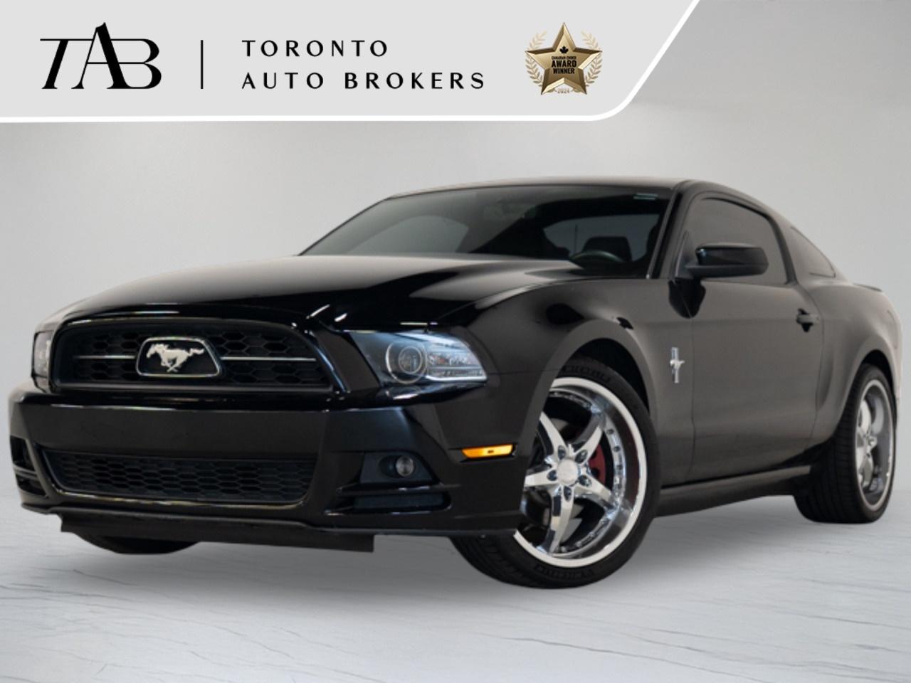 This 2014 Ford Mustang V6 Premium is a local Ontario vehicle that delivers classic American muscle car styling with the added engagement of a 6-speed manual transmission. Powered by a 3.7L Ti-VCT V6 engine producing 305 horsepower, this Mustang offers impressive performance, responsive handling, and an exhilarating driving experience. With its well-appointed Premium trim, comfortable interior, and iconic design, this Mustang is the perfect blend of everyday practicality and spirited performance.

Key Features:

6-Speed Manual Transmission
Rear-Wheel Drive (RWD)
Local Ontario Vehicle
Leather-Trimmed Seating Surfaces
Power Drivers Seat
Heated Front Seats
Bluetooth&reg; Connectivity
Automatic Climate Control
Cruise Control

NOW OFFERING 3 MONTH DEFERRED FINANCING PAYMENTS ON APPROVED CREDIT. 

WE OFFER THE BEST FINANCE RATES, AND DONT CHARGE ANY FINANCING FEE

Looking for a top-rated pre-owned luxury car dealership in the GTA? Look no further than Toronto Auto Brokers (TAB)! Were proud to have won multiple awards, including the 2024 AutoTrader Best Priced Dealer, the 2026 Best in Business award, the 2025 CarGurus Award, the 2026 Top Choice Award, the 2026 Dealer Rater Consumer Satisfaction Award, the 2026 Canadian Choice Award, the 2026 Three Best Rated Dealer Award, and many more!

With 30 years of experience serving the Greater Toronto Area, TAB is a respected and trusted name in the pre-owned luxury car industry. Our 30,000 sq.Ft indoor showroom is home to a wide range of luxury vehicles from top brands like BMW, Mercedes-Benz, Audi, Porsche, Land Rover, Jaguar, Aston Martin, Bentley, Maserati, and more. And we dont just serve the GTA, were proud to offer our services to all cities in Canada, including Vancouver, Montreal, Calgary, Edmonton, Winnipeg, Saskatchewan, Halifax, and more.

At TAB, were committed to providing a no-pressure environment and honest work ethics. As a family-owned and operated business, we treat every customer like family and ensure that every interaction is a positive one. Come experience the TAB Lifestyle at its truest form, luxury car buying has never been more enjoyable and exciting!

We offer a variety of services to make your purchase experience as easy and stress-free as possible. From competitive and simple financing and leasing options to extended warranties, aftermarket services, and full history reports on every vehicle, we have everything you need to make an informed decision. We welcome every trade, even if youre just looking to sell your car without buying, and when it comes to financing or leasing, we offer same day approvals, with access to over 50 lenders, including all of the banks in Canada. Feel free to check out your own Equifax credit score without affecting your credit score, simply click on the Equifax tab above and see if you qualify.


Call us today or visit our website to learn more about our inventory and services. And remember, all prices exclude applicable taxes and licensing, and vehicles can be certified at an additional cost of $999.