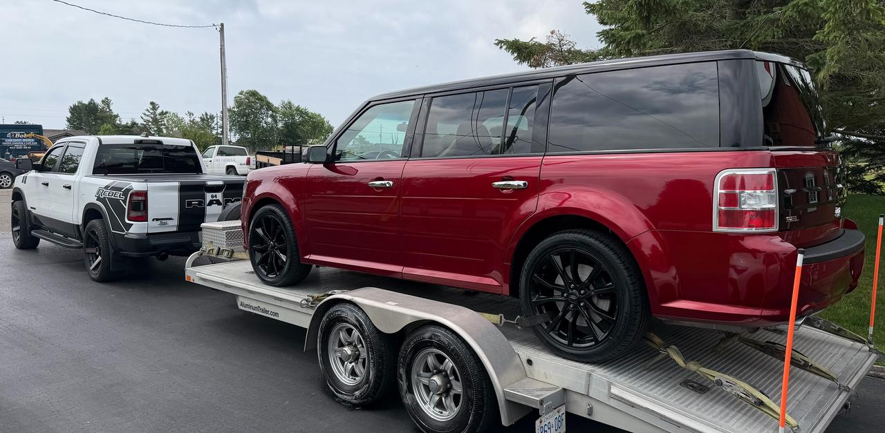<p><strong>JUST IN!........2019 FORD FLEX SEL AWD 7-PASSENGER. SHARP RUBY RED METALLIC WITH AGATE BLACK PAINTED ROOF! GRAY LEATHER SEATS. 143,800 KMS. 3.5 LTR V6 WITH 6 SPEED TRANS. LOCAL VEHICLE. SUPER CLEAN INSIDE & OUT! CARFAX CANADA CLEAN....NO ACCIDENTS. ALL BRAND NEW TIRES ON 20 BLACK UPGRADED RIMS! ALL NEW BRAKES & ROTORS! FRESH PAINT SEALANT! MICHELIN SNOW TIRES ON RIMS INCLUDED! NEW FULL SYNTHETIC OIL. NEW WEATHERTECH FLOOR LINERS! RECENT NEW BATTERY. INCLUDES APPEARANCE PACKAGE & EQUIPMENT GROUP 202A AS LISTED IN PICS. ALSO TRIPLE PANO SUNROOF. PREMIUM AUDIO SYSTEM. REAR A/C & HEAT. HEATED LEATHER POWER SEATS. GPS NAVIGATION & APPLE CARPLAY! BLIND SIDE ALERT. REAR CROSS TRAFFIC ALERT. REAR PARKING SENSORS. NEW REAR VISION CAMERA LENS. REMOTE START. PUSH BUTTON START WITH 2 SENTRY ENTRY SMART FAUBS. DRIVERS DOOR KEYPAD ENTRY. BLUETOOTH. VOICE COMMAND. DUAL CLIMATE CONTROL. UNIVERSAL GARAGE DOOR OPENER & MUCH MORE! CERTIFIED WITH A 30 DAY B TO B GAURANTEE. $18,995.00 (HST & MTO FEES EXTRA) CONTACT CHRIS @ 905-774-1965 or petescarsales@gmail.com www.petescarsales.com&nbsp; &nbsp;</strong></p>