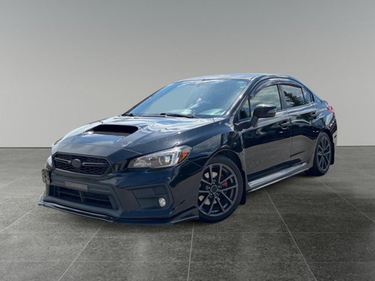 House of Cars Olympic Park An AMVIC licensed automotive retail dealer Location: 8525 Bowfort Rd. N.W Call: 587-356-1144  Stock #: 5458-6 Year: 2018 Make: Subaru Model: Impreza WRX Sport Tech w/ RS Pkg. AWD VIN: JF1VA1K69J9833065 KM: 140,769 Color: Black Transmission: Manual Drivetrain: AWD Body Style: Sedan  Key Features: 6-Speed Manual Transmission Symmetrical All Wheel Drive Turbocharged BOXER Engine Recaro Sport Seats Heated Front Seats Power Sunroof Navigation System Harman Kardon Premium Audio System Blind Spot Detection Back Up Camera Apple CarPlay & Android Auto Push Button Start LED Steering Responsive Headlights  Additional Highlights: CARFAX Included Professionally Detailed 1000+ Vehicles In Stock  Visit House of Cars Olympic Park or call 587-356-1144 to schedule your test drive today!