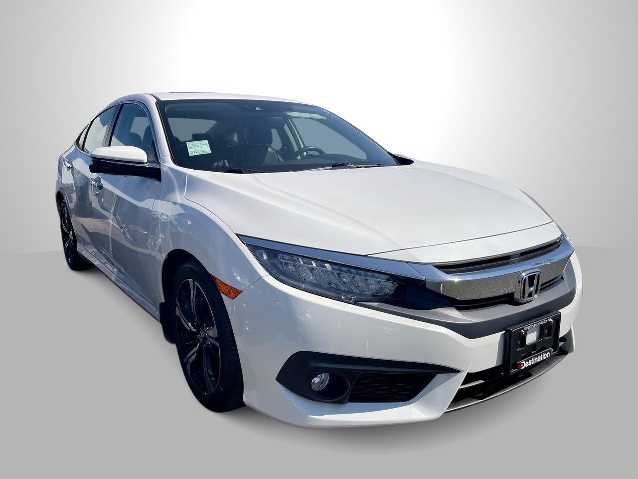 <em>2018 Honda Civic Sport&nbsp;</em>

<em>.</em>

<em>The 2018 Honda Civic Touring offers a great blend of sporty performance, premium comfort, and modern technology. Featuring leather seating, a power moonroof, heated front seats, navigation, a premium audio system, and advanced Honda Sensing safety features, the Civic Touring is a well-equipped and stylish choice for everyday driving.</em>

<em>.</em>

<strong>Best Price First! </strong>

<strong>.</strong>

<strong>At Destination Mazda, we believe in transparency and simplicity when it comes to buying a used vehicle.</strong>

<strong>.</strong>

<strong>No Haggling, No Guesswork! </strong>

<strong>.</strong>

<strong>Say goodbye to the stress of negotiations. Our absolute best price is prominently displayed on every used vehicle, eliminating the need for haggling. Weve done the market research for you, setting our prices based on the current market & condition of the vehicle, ensuring you get the most competitive deal possible.</strong>

<strong>.</strong>

<strong>Why Choose Destination Mazda</strong>

<strong>1. Best Price First</strong>

<strong>2. No Hidden Fees ($895 Doc Fee)</strong>

<strong>3. Market Pricing Analysis for Transparency</strong>

<strong>4. Up to 153-Point Safety Inspection</strong>



<strong>Discover the Difference at Destination Mazda</strong>

<strong>1595 Boundary Road, Vancouver BC</strong>

<strong>604-294-4299</strong>

<strong>VSA#: 31160</strong>