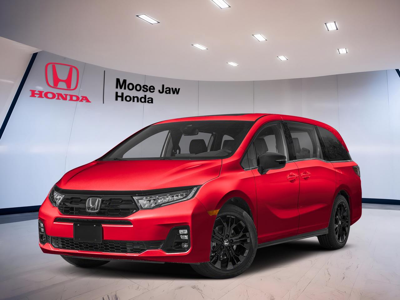 The 2026 Honda Odyssey Black Edition is a brand new minivan built for busy family life in Moose Jaw. Its bold red exterior and black interior give it a confident look, while the 3.5-litre direct-injection i-VTEC V6 and 10-speed automatic transmission deliver smooth, capable power every day.

At Moose Jaw Honda, this 2026 Honda Odyssey Black Edition stands out with front-wheel drive traction, refined road manners, and practical versatility. It is designed to make daily driving easier, from school runs to weekend travel, with the comfort, space, and trusted engineering Canadian families want.

FEATURES OF THE Odyssey Black Edition

»» Black Edition adds unique exterior accents
»» Distinctive black styling details throughout design
»» Powerful V6 performance for family travel
»» Spacious cabin with premium Odyssey versatility

ADVANCED SAFETY FEATURES

»» Honda Sensing suite supports safer driving
»» Collision mitigation braking helps avoid impacts
»» Lane keeping assist adds highway confidence
»» Adaptive cruise control supports relaxed travel

PERFORMANCE AND EFFICIENCY

»» 3.5-litre V6 delivers strong smooth power
»» 10-speed automatic supports refined acceleration
»» Front-wheel drive offers confident everyday traction
»» Direct injection helps optimize engine response

COMFORT AND CONVENIENCE

»» Spacious cabin suits families and carpools
»» Three-row layout supports flexible passenger seating
»» Easy access helps simplify daily entry
»» Quiet ride improves long-trip comfort

TECHNOLOGY AND CONNECTIVITY

»» Clear infotainment layout supports easy use
»» Driver information display keeps data visible
»» Steering-wheel controls simplify common functions
»» Multiple connectivity features support daily driving

CARGO SPACE

»» Large rear cargo area adds versatility
»» Flexible interior supports people and gear
»» Wide opening helps loading larger items
»» Ideal for errands trips and luggage

WHAT OTHER OWNERS LIKE

»» Smooth V6 power for highway passing
»» Family-friendly cabin with useful flexibility
»» Comfortable ride for daily commutes
»» Strong overall practicality for busy households

The 2026 Honda Odyssey Black Edition is well suited to families who need room, comfort, and dependable performance in one smart package. The V6 engine offers strong passing power and smooth cruising, while the 10-speed automatic helps keep every drive refined and controlled in city traffic or on the highway.

Its red exterior gives this minivan a fresh and upscale presence, and the black interior creates a clean, modern cabin feel. This 2026 Honda Odyssey Black Edition is built to handle real life with ease, offering the kind of passenger space and flexibility that make every trip simpler and more enjoyable.

For drivers in Moose Jaw who want a new minivan with proven capability and premium character, this model is an excellent fit. The 2026 Honda Odyssey Black Edition brings together power, comfort, and everyday practicality in a family vehicle that is ready for work, travel, and everything in between.

This 2026 Honda Odyssey Black Editions VIN is: 5FNRL6H0XTB503742.<p>The 2026 Honda Odyssey Black Edition is a brand new minivan built for busy family life in Moose Jaw. Its bold red exterior and black interior give it a confident look</p>
<p> and trusted engineering Canadian families want.

FEATURES OF THE Odyssey Black Edition

»» Black Edition adds unique exterior accents
»» Distinctive black styling details throughout design
»» Powerful V6 performance for family travel
»» Spacious cabin with premium Odyssey versatility

ADVANCED SAFETY FEATURES

»» Honda Sensing suite supports safer driving
»» Collision mitigation braking helps avoid impacts
»» Lane keeping assist adds highway confidence
»» Adaptive cruise control supports relaxed travel

PERFORMANCE AND EFFICIENCY

»» 3.5-litre V6 delivers strong smooth power
»» 10-speed automatic supports refined acceleration
»» Front-wheel drive offers confident everyday traction
»» Direct injection helps optimize engine response

COMFORT AND CONVENIENCE

»» Spacious cabin suits families and carpools
»» Three-row layout supports flexible passenger seating
»» Easy access helps simplify daily entry
»» Quiet ride improves long-trip comfort

TECHNOLOGY AND CONNECTIVITY

»» Clear infotainment layout supports easy use
»» Driver information display keeps data visible
»» Steering-wheel controls simplify common functions
»» Multiple connectivity features support daily driving

CARGO SPACE

»» Large rear cargo area adds versatility
»» Flexible interior supports people and gear
»» Wide opening helps loading larger items
»» Ideal for errands trips and luggage

WHAT OTHER OWNERS LIKE

»» Smooth V6 power for highway passing
»» Family-friendly cabin with useful flexibility
»» Comfortable ride for daily commutes
»» Strong overall practicality for busy households

The 2026 Honda Odyssey Black Edition is well suited to families who need room</p>
<p> and dependable performance in one smart package. The V6 engine offers strong passing power and smooth cruising</p>
<p> while the 10-speed automatic helps keep every drive refined and controlled in city traffic or on the highway.

Its red exterior gives this minivan a fresh and upscale presence</p>
<p> offering the kind of passenger space and flexibility that make every trip simpler and more enjoyable.

For drivers in Moose Jaw who want a new minivan with proven capability and premium character</p>