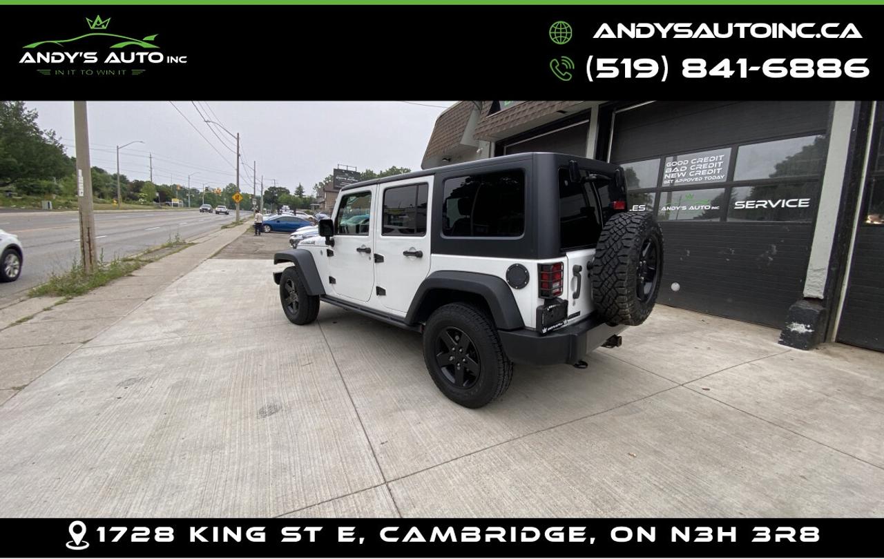 2016 Jeep Wrangler UNLIMITED SPORT ! AUTO ! 4X4 ! HARD AND S UNLIMITED SPORT ! AUTO ! 4X4 ! HARD AND SOFT TOP Photo