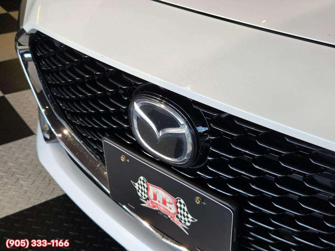 2024 Mazda 3 GT w/Turbo Bose® 12-Speaker Premium Audio • Active Driving Display (HUD) • Leather-Trimmed Upholstery • i-Activ AWD • Wir Photo