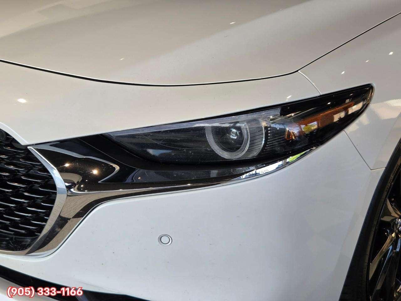 2024 Mazda 3 GT w/Turbo Bose® 12-Speaker Premium Audio • Active Driving Display (HUD) • Leather-Trimmed Upholstery • i-Activ AWD • Wir Photo3