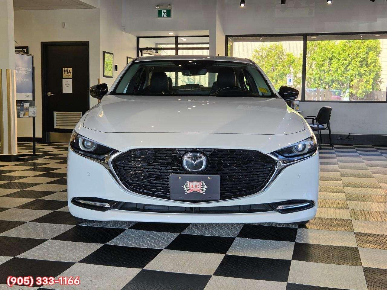 2024 Mazda 3 GT w/Turbo Bose® 12-Speaker Premium Audio • Active Driving Display (HUD) • Leather-Trimmed Upholstery • i-Activ AWD • Wir Photo1