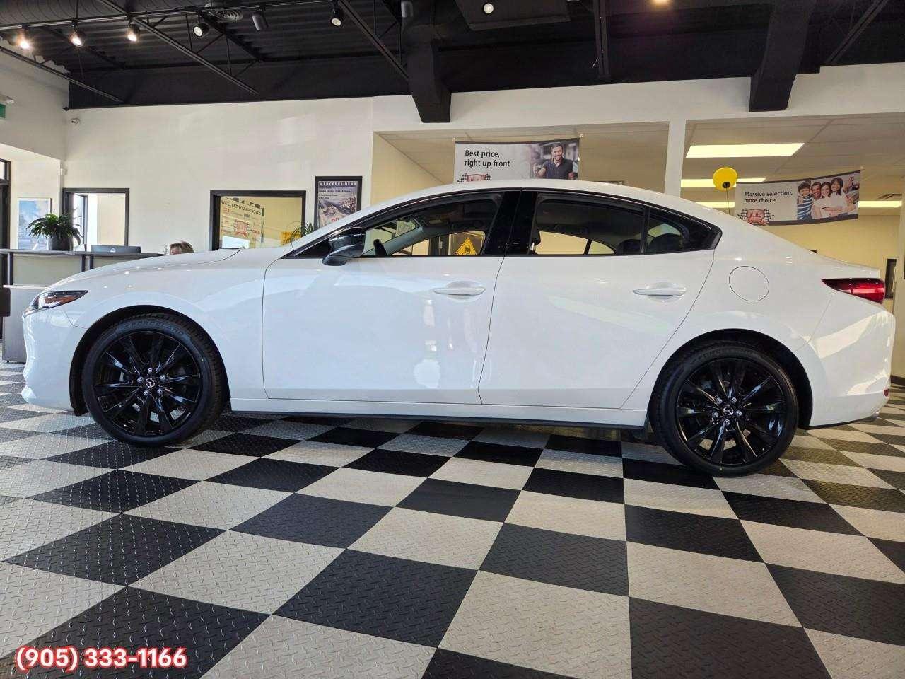 2024 Mazda 3 GT w/Turbo Bose® 12-Speaker Premium Audio • Active Driving Display (HUD) • Leather-Trimmed Upholstery • i-Activ AWD • Wir Photo
