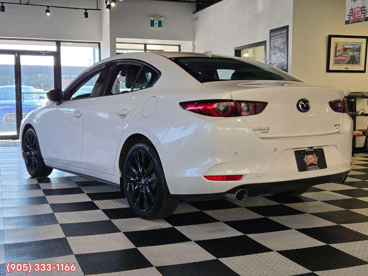 2024 Mazda 3 GT w/Turbo Bose® 12-Speaker Premium Audio • Active Driving Display (HUD) • Leather-Trimmed Upholstery • i-Activ AWD • Wir Photo