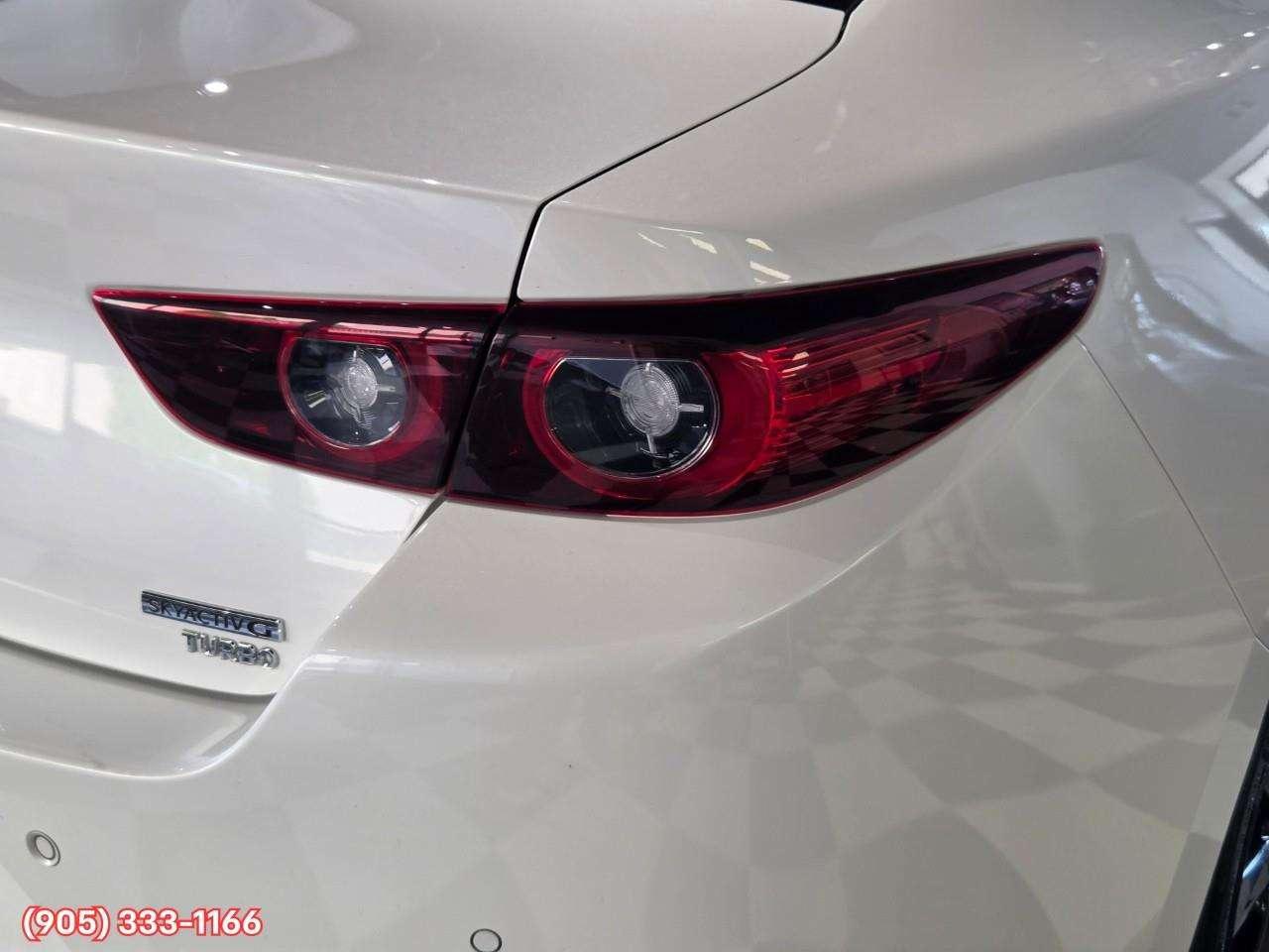 2024 Mazda 3 GT w/Turbo Bose® 12-Speaker Premium Audio • Active Driving Display (HUD) • Leather-Trimmed Upholstery • i-Activ AWD • Wir Photo