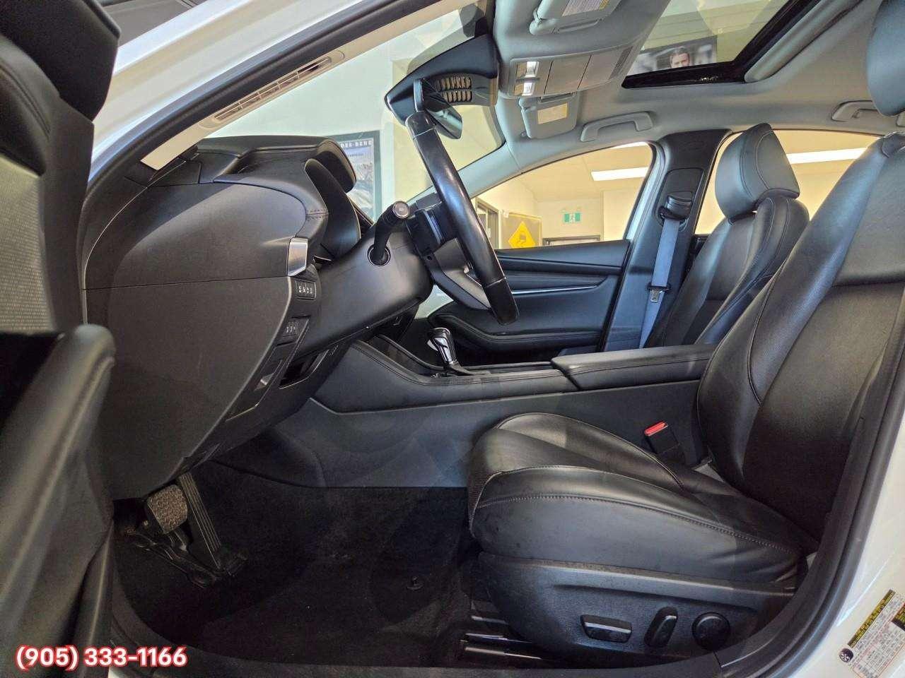 2024 Mazda 3 GT w/Turbo Bose® 12-Speaker Premium Audio • Active Driving Display (HUD) • Leather-Trimmed Upholstery • i-Activ AWD • Wir Photo