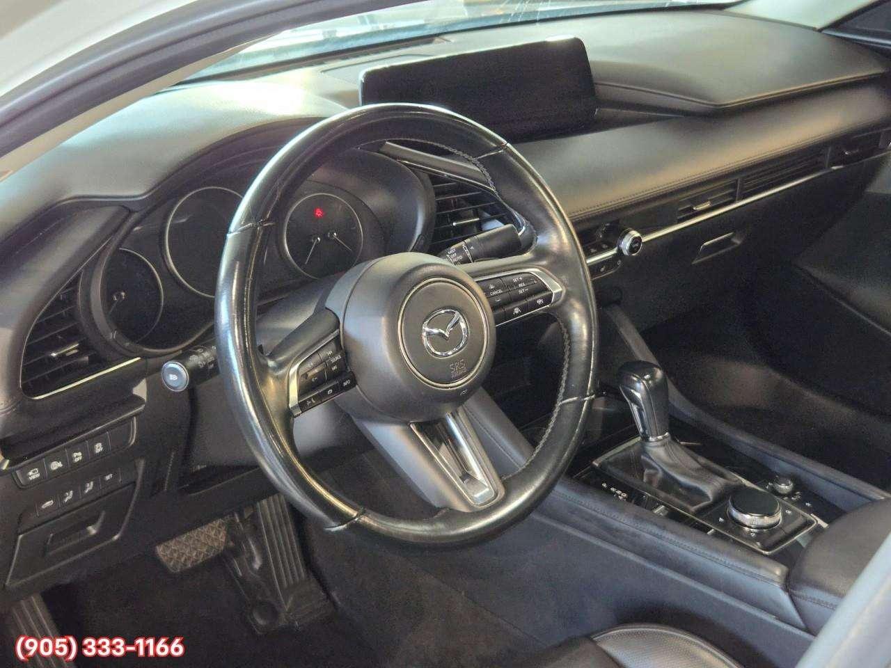 2024 Mazda 3 GT w/Turbo Bose® 12-Speaker Premium Audio • Active Driving Display (HUD) • Leather-Trimmed Upholstery • i-Activ AWD • Wir Photo