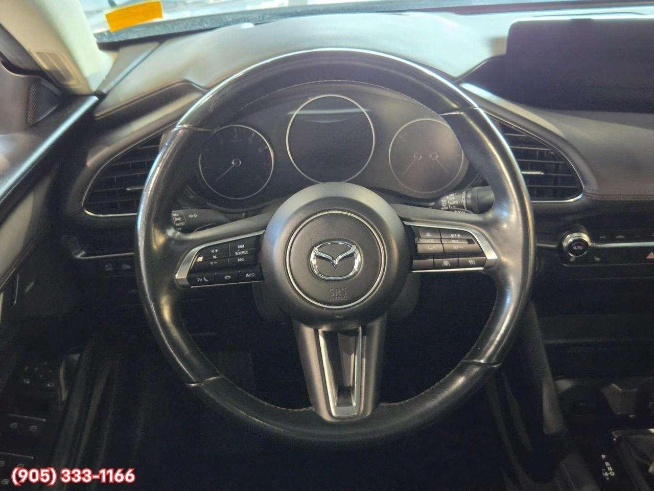 2024 Mazda 3 GT w/Turbo Bose® 12-Speaker Premium Audio • Active Driving Display (HUD) • Leather-Trimmed Upholstery • i-Activ AWD • Wir Photo